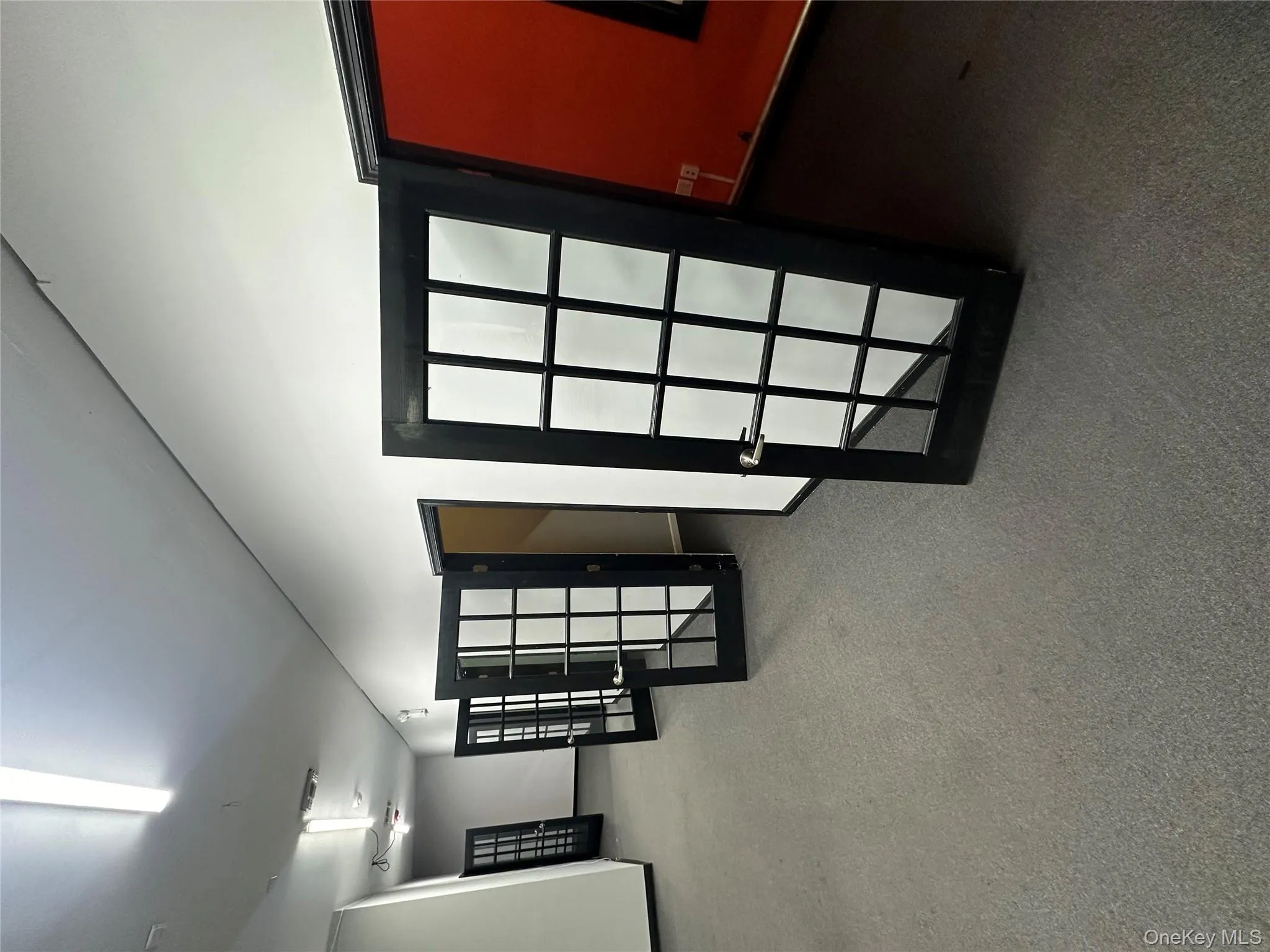 Unfurnished room with carpet flooring Unfurnished room with carpet flooring