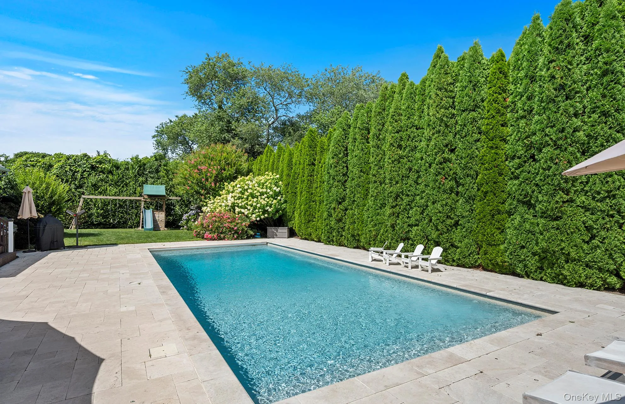 Outdoor pool featuring a patio Outdoor pool featuring a patio