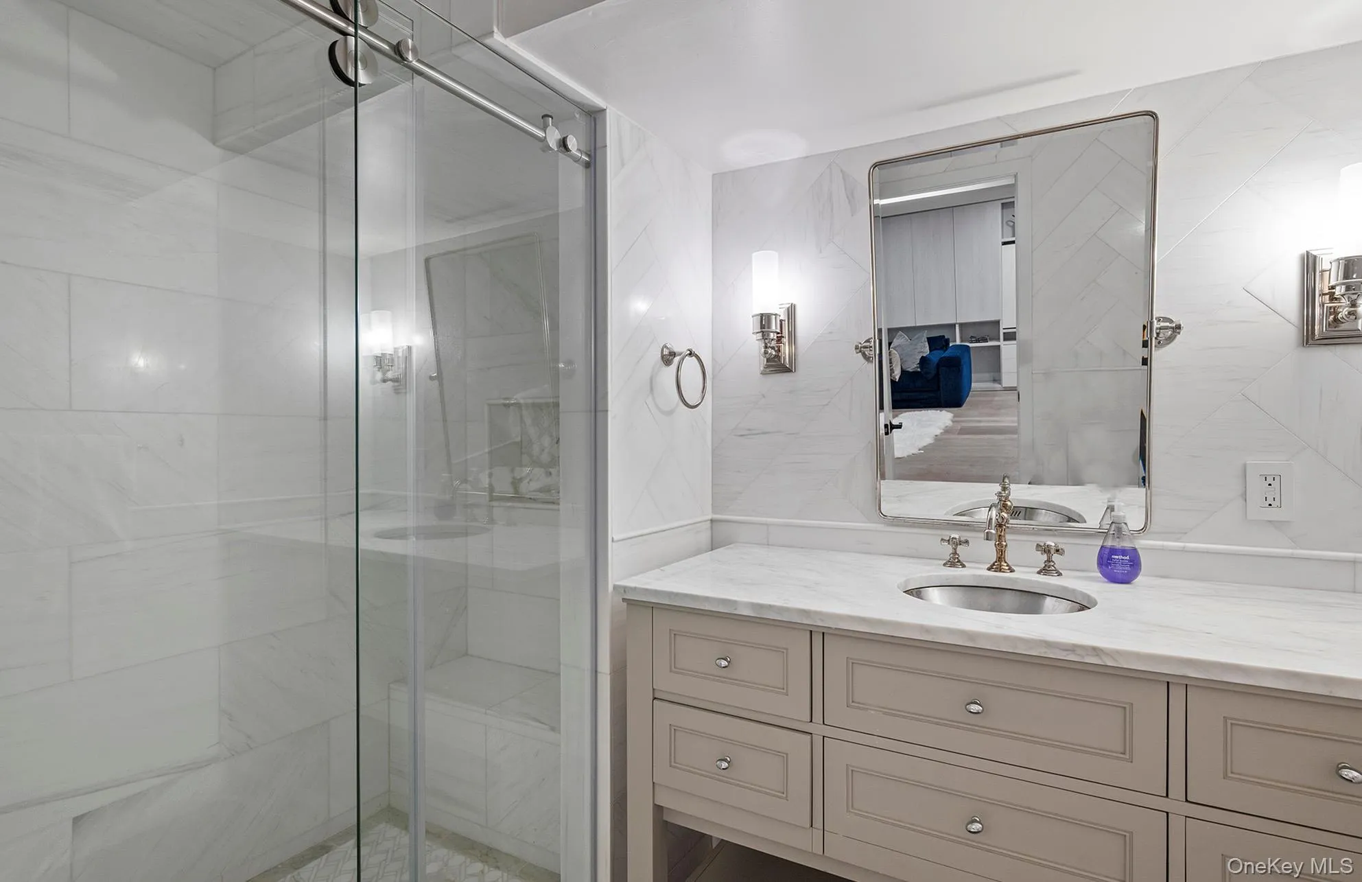 Full bathroom featuring vanity and a stall shower Full bathroom featuring vanity and a stall shower