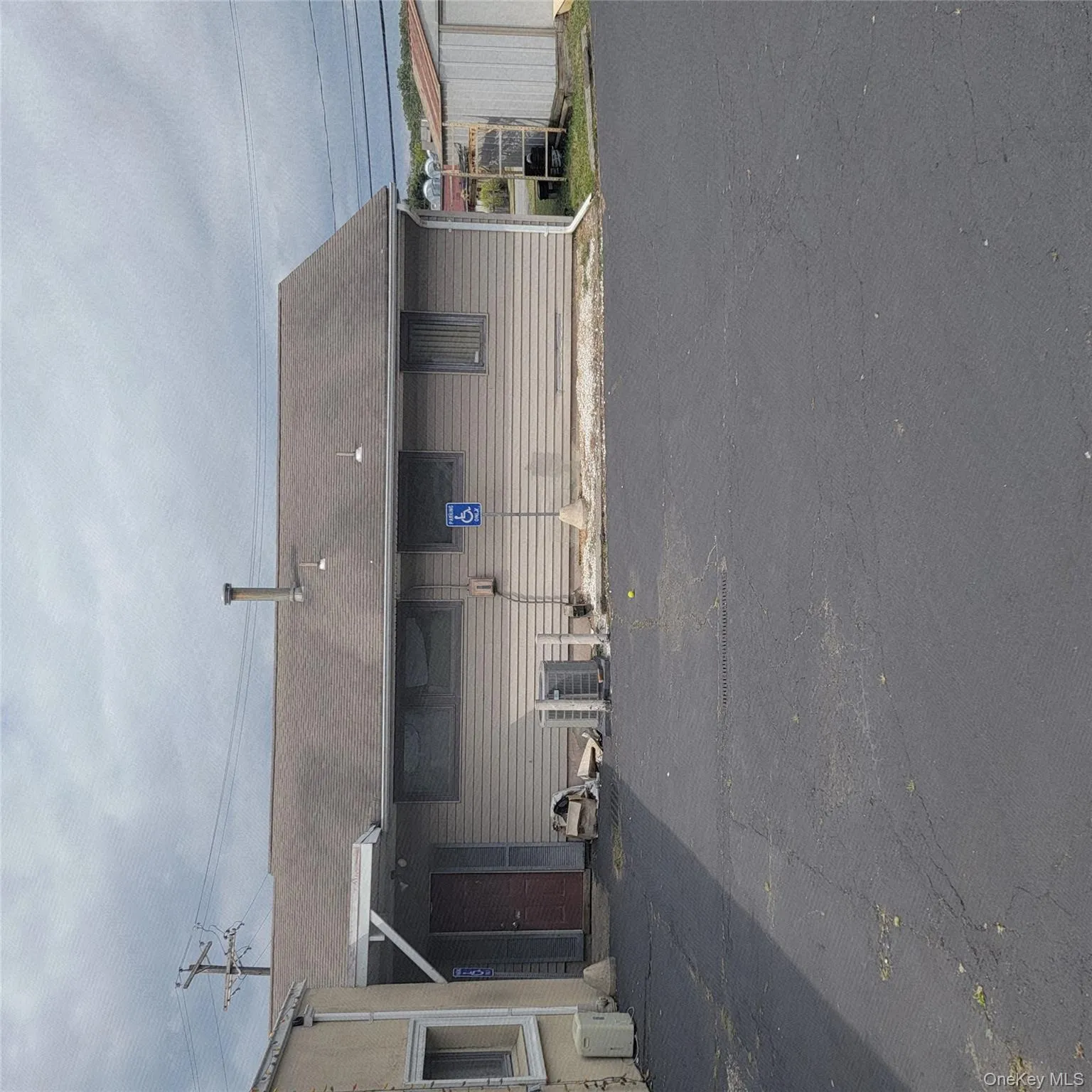 View of front facade with a shingled roof View of front facade with a shingled roof