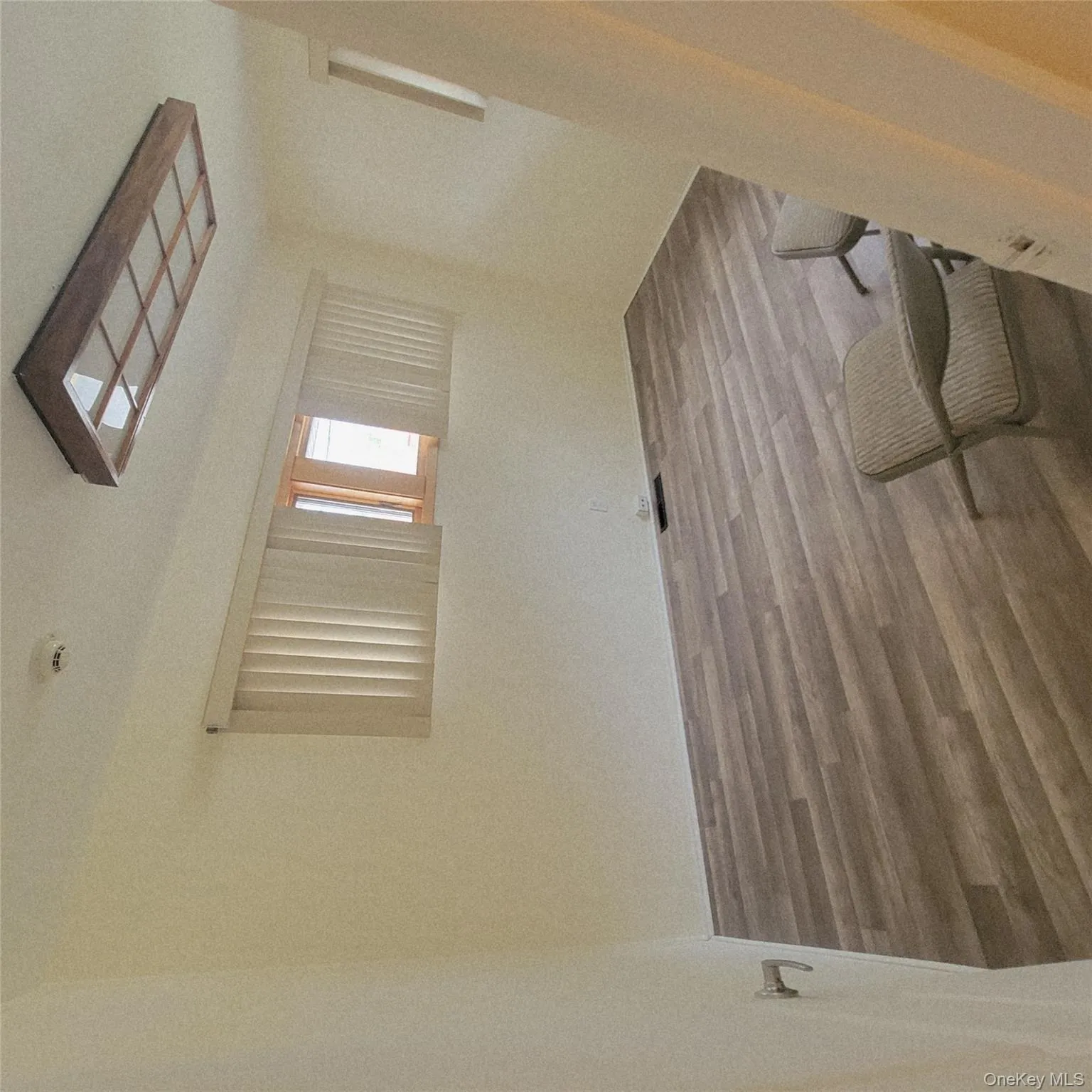 Spare room with wood finished floors Spare room with wood finished floors