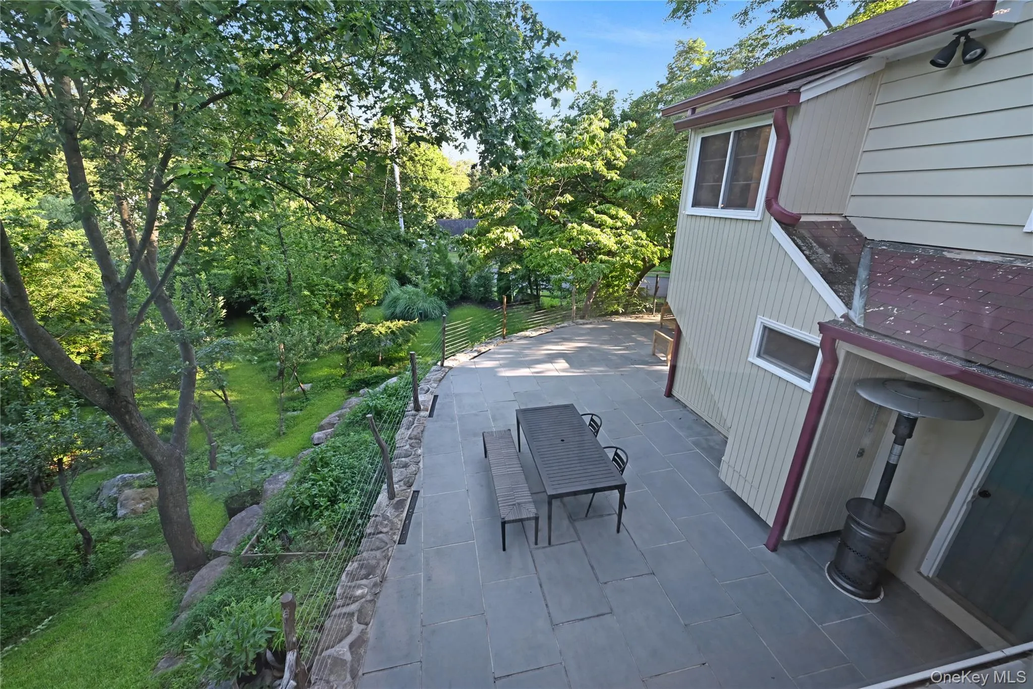 View of patio with view of wooded area View of patio with view of wooded area