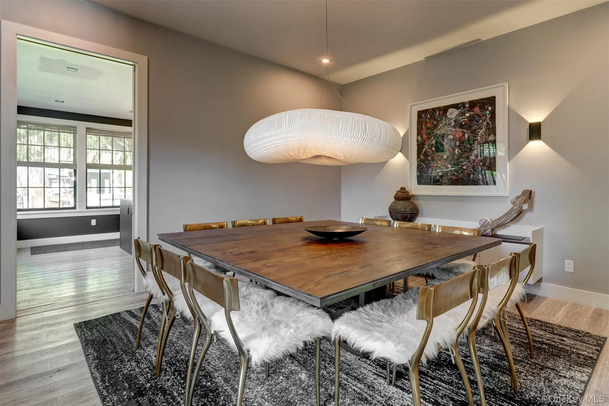 Dining area featuring light wood-style flooring and baseboards Dining area featuring light wood-style flooring and baseboards