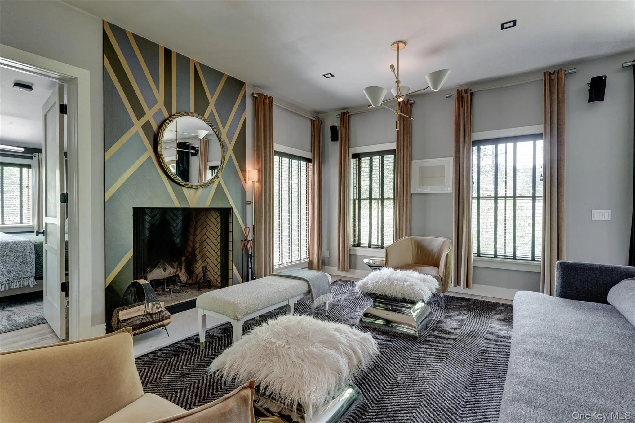 Living room with healthy amount of natural light and a fireplace Living room with healthy amount of natural light and a fireplace