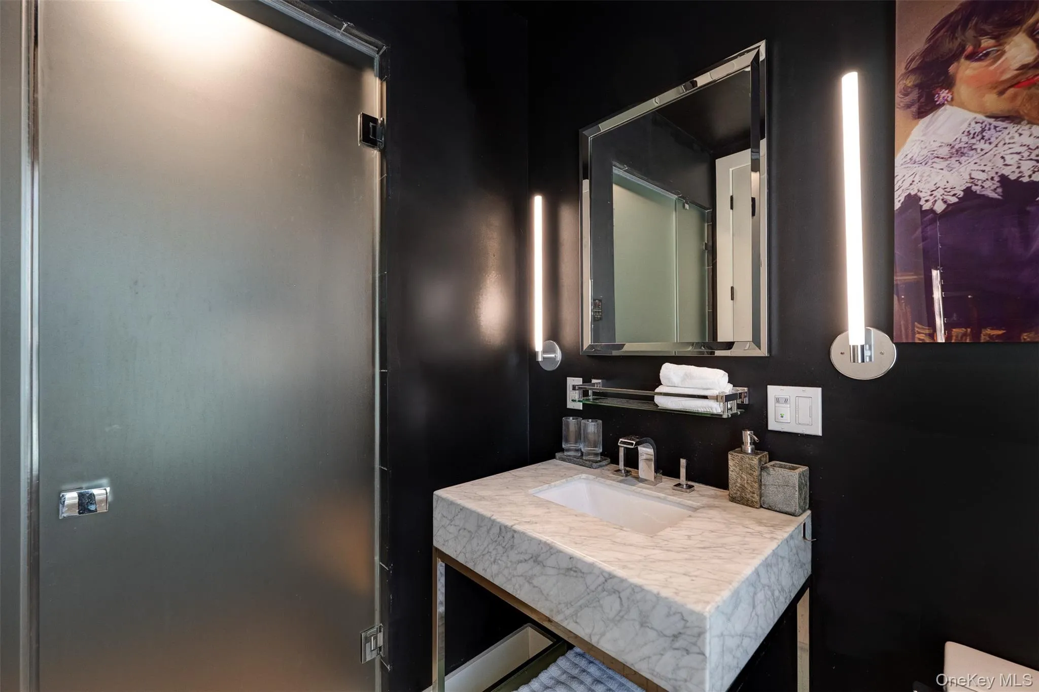 Bathroom featuring vanity Bathroom featuring vanity