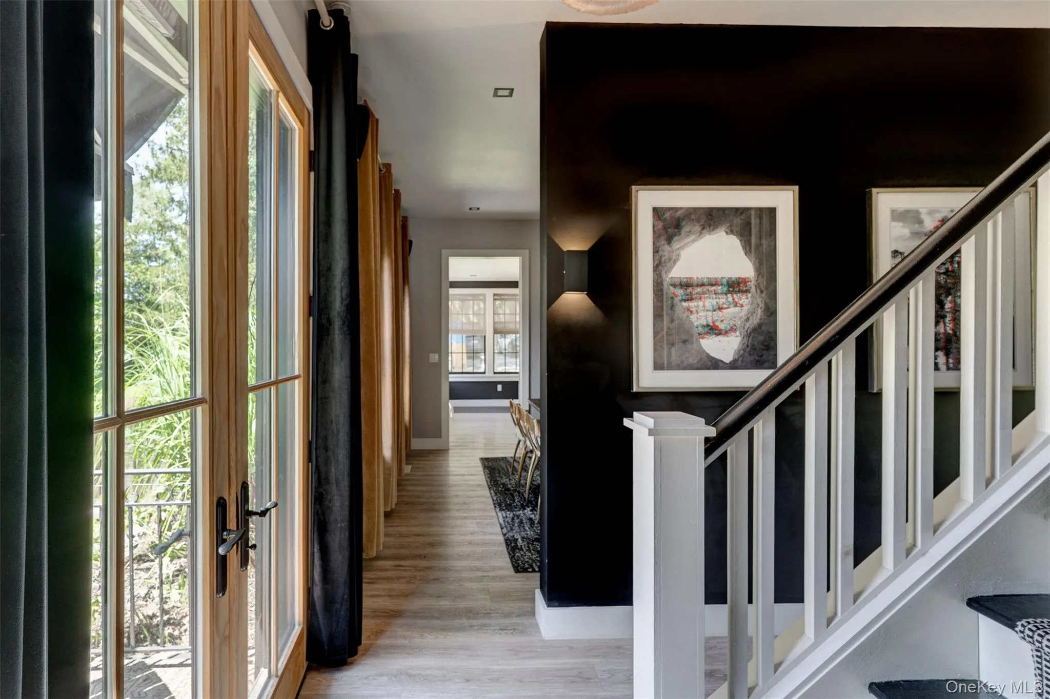 Foyer with light wood finished floors and baseboards Foyer with light wood finished floors and baseboards
