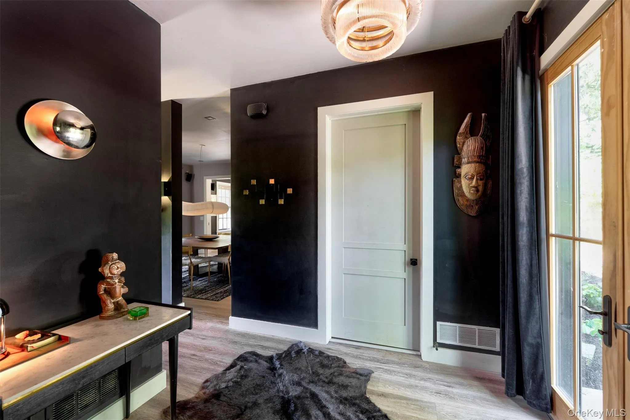 Entryway with light wood-style flooring Entryway with light wood-style flooring