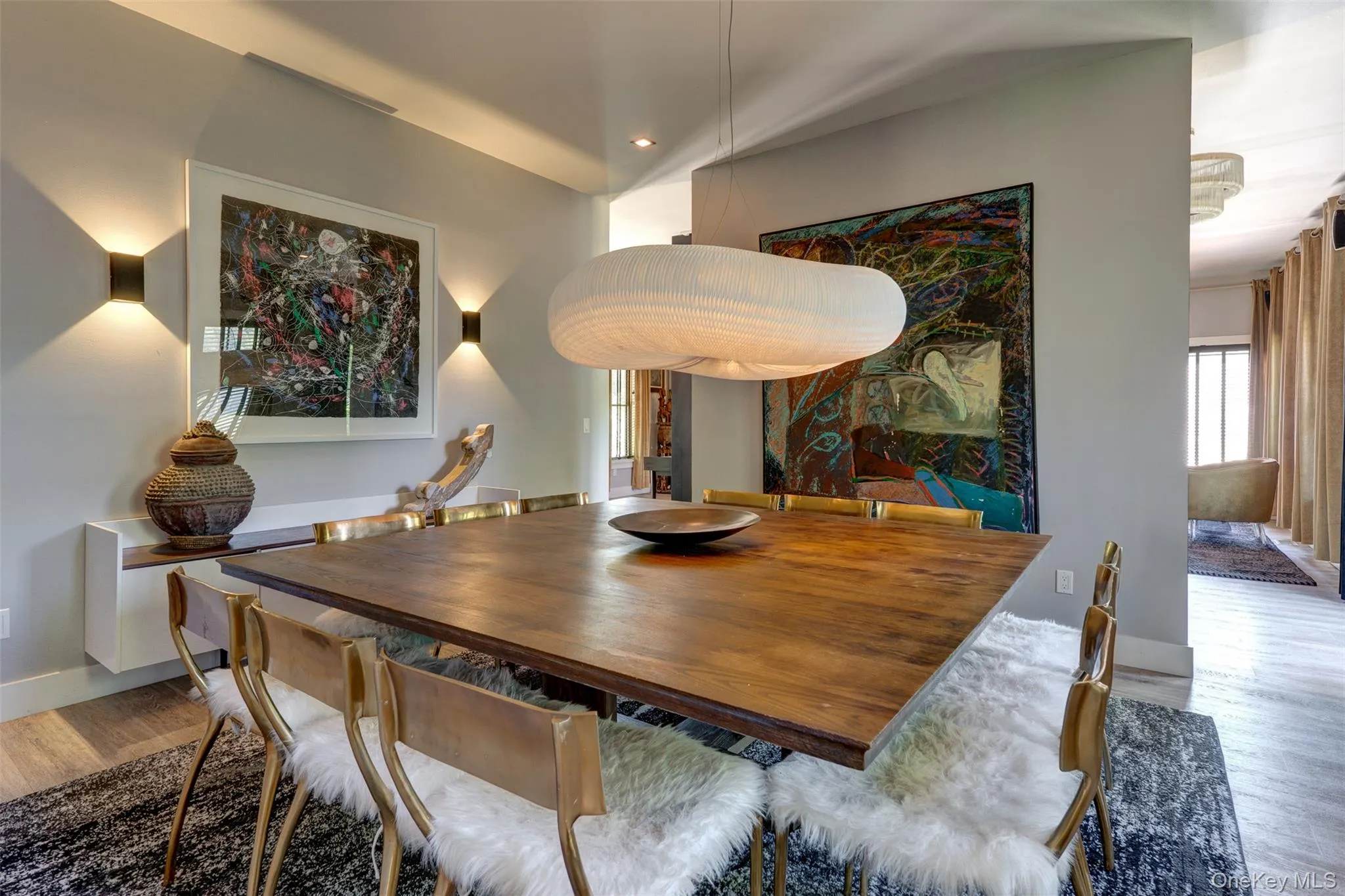 Dining room with wood finished floors and recessed lighting Dining room with wood finished floors and recessed lighting