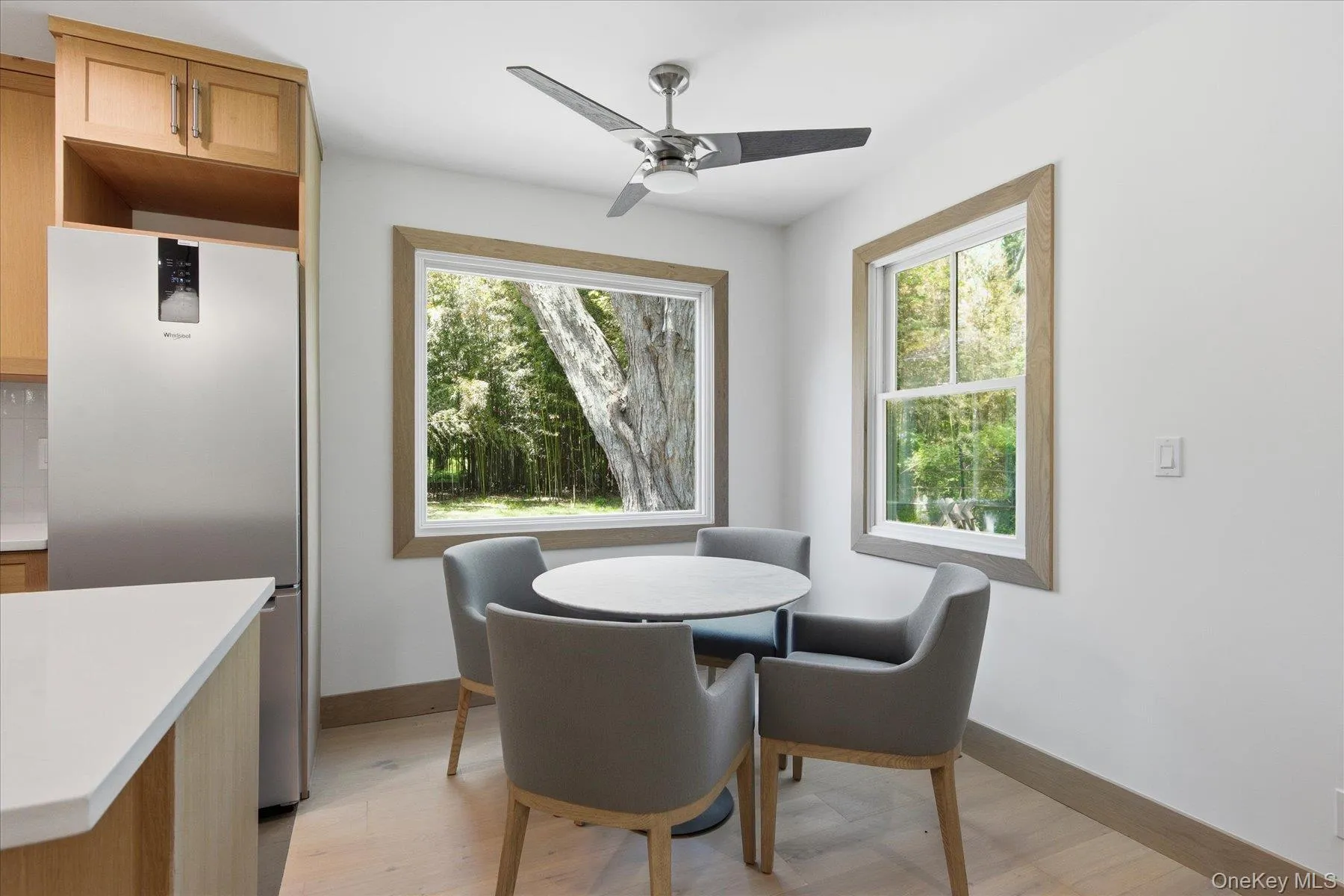 Dining with large picture window to yard Dining with large picture window to yard