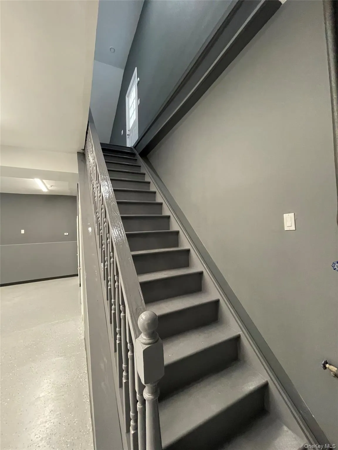 View of stairs leading up to Office Space. View of stairs leading up to Office Space.