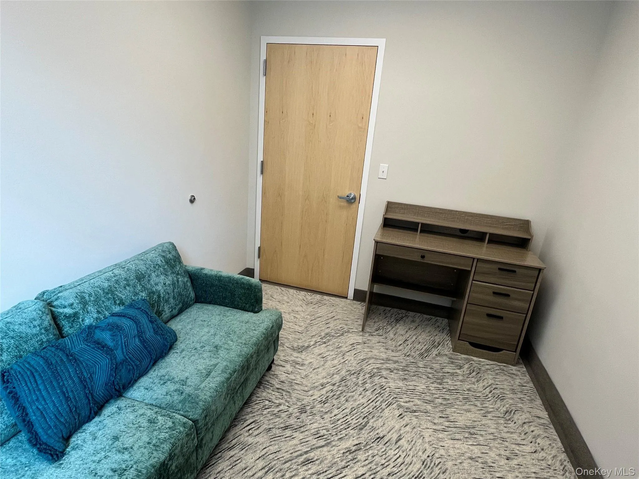 Living area with baseboards Living area with baseboards