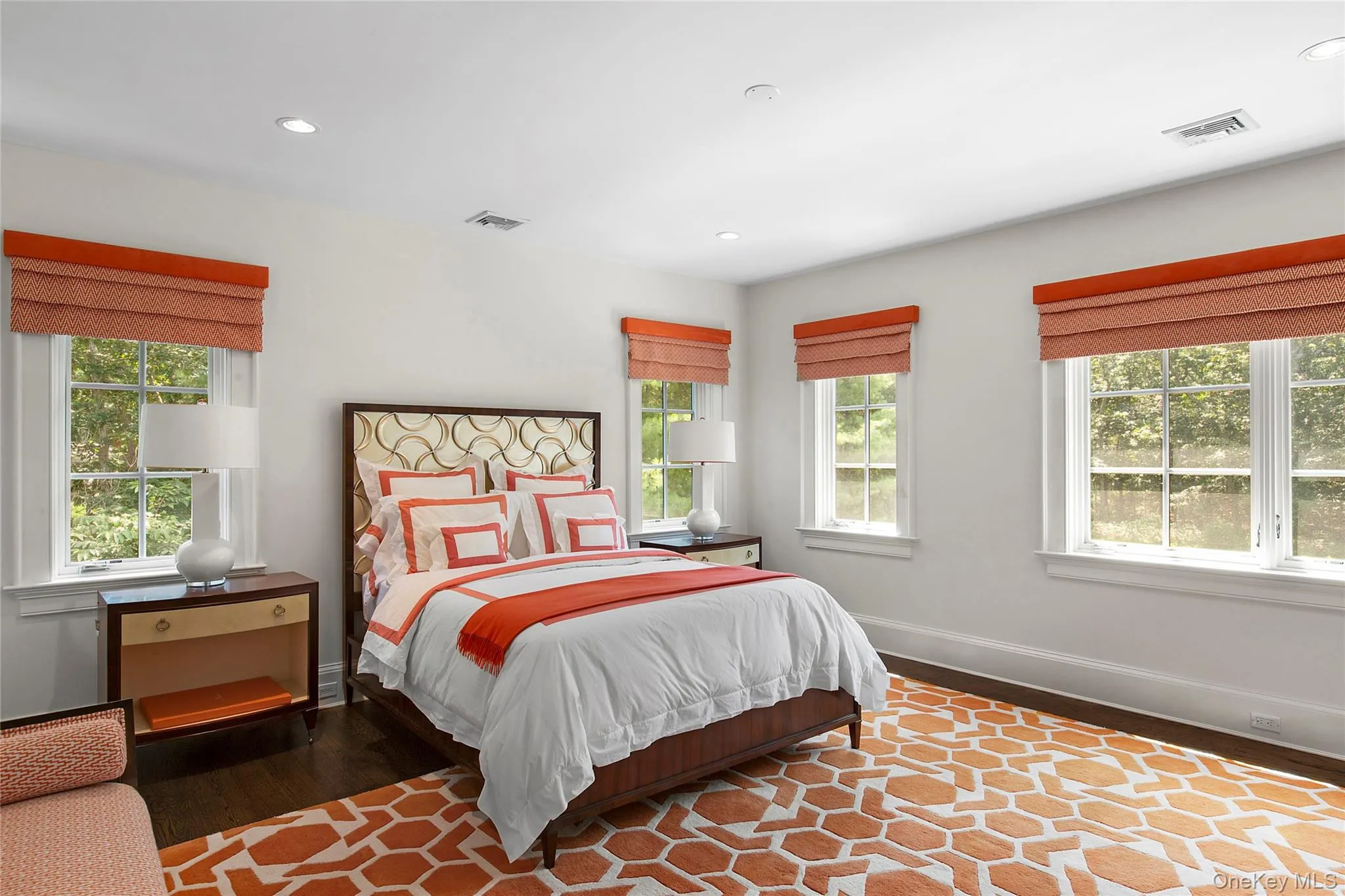 Bedroom featuring wood finished floors and recessed lighting
