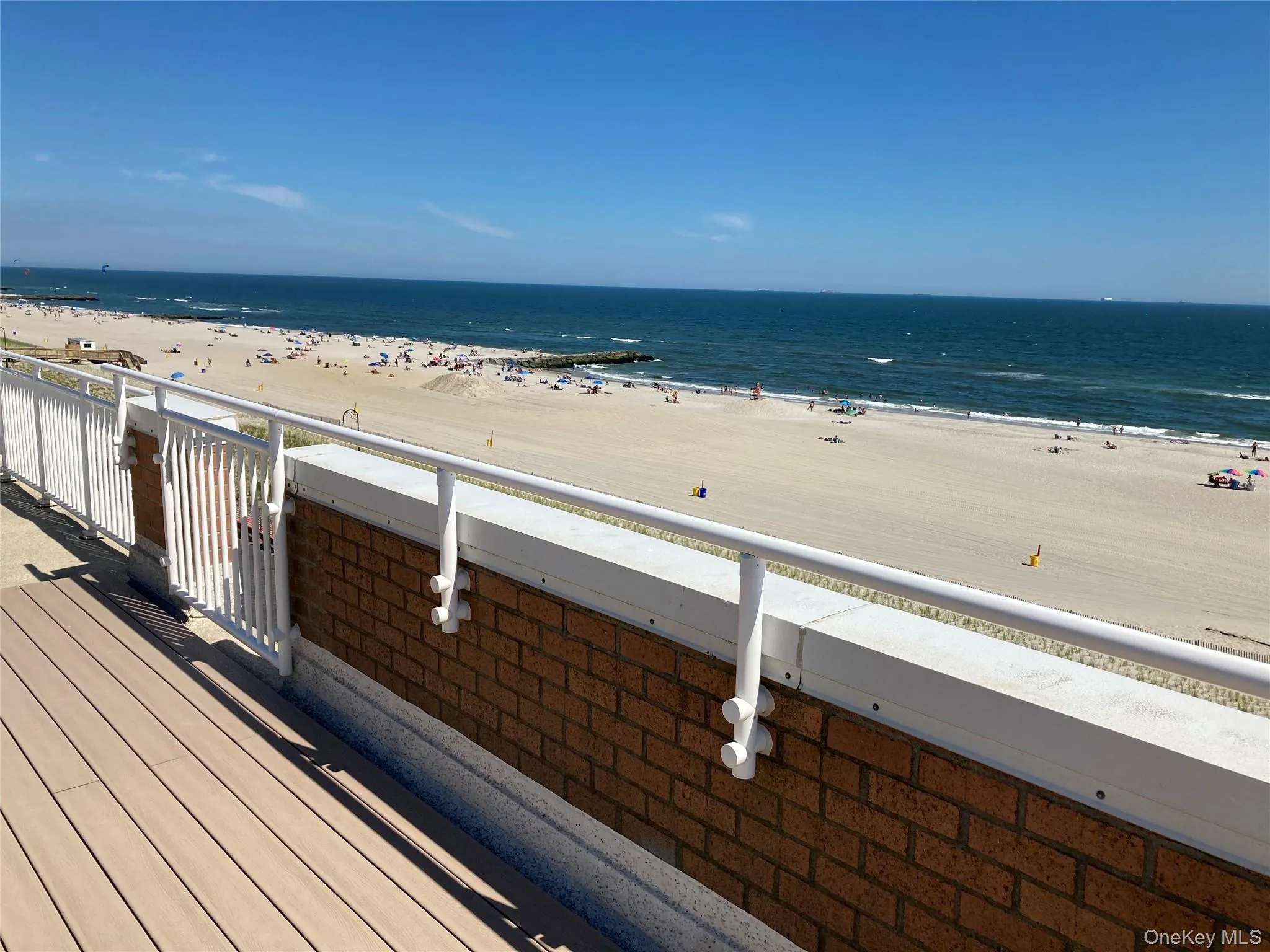Water view featuring local beach Water view featuring local beach