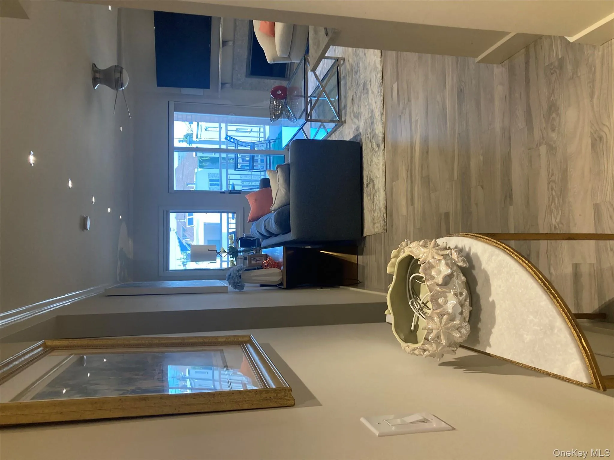 Hall featuring light wood-style flooring and recessed lighting Hall featuring light wood-style flooring and recessed lighting