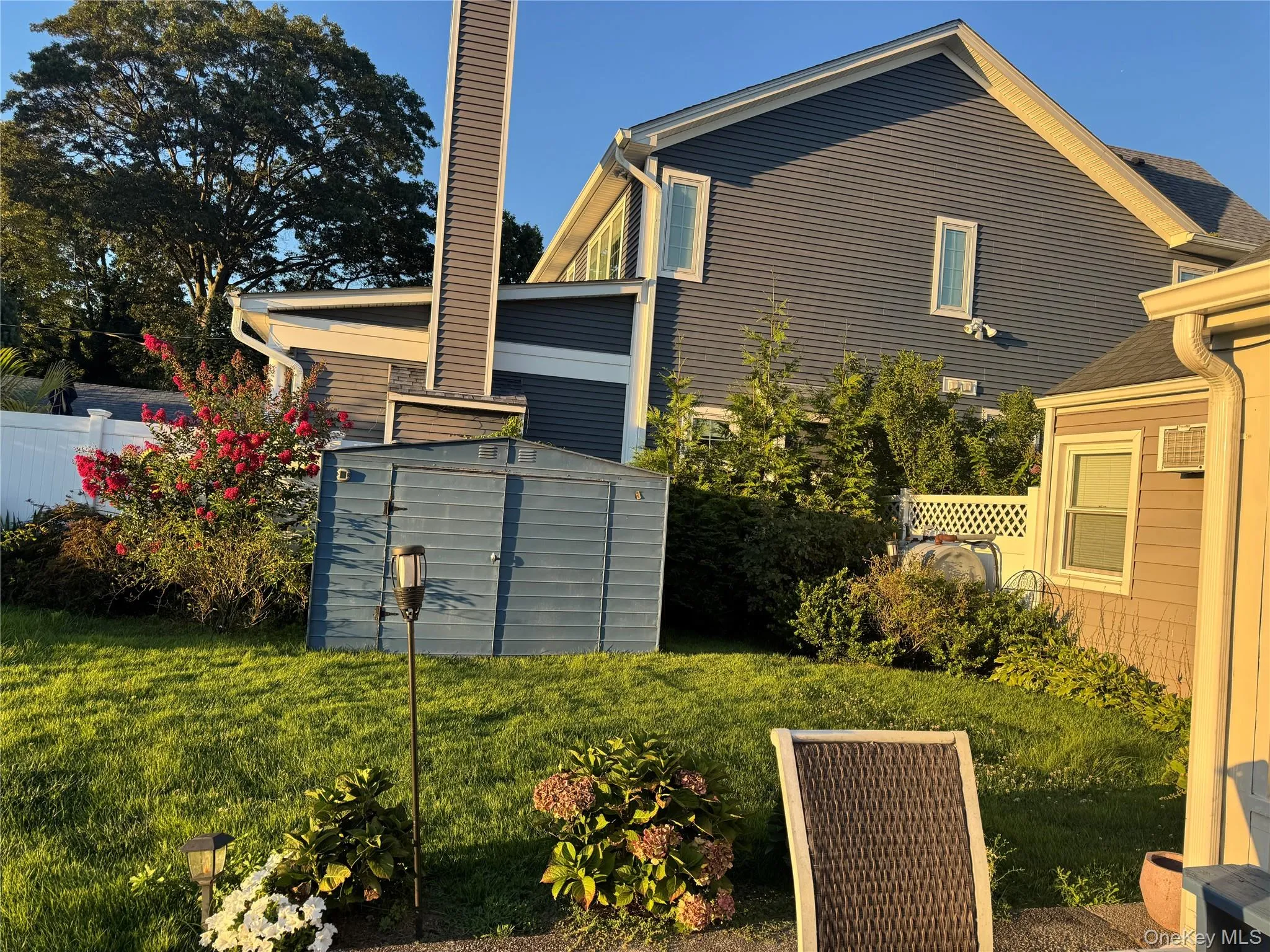 View of property exterior featuring a storage shed View of property exterior featuring a storage shed