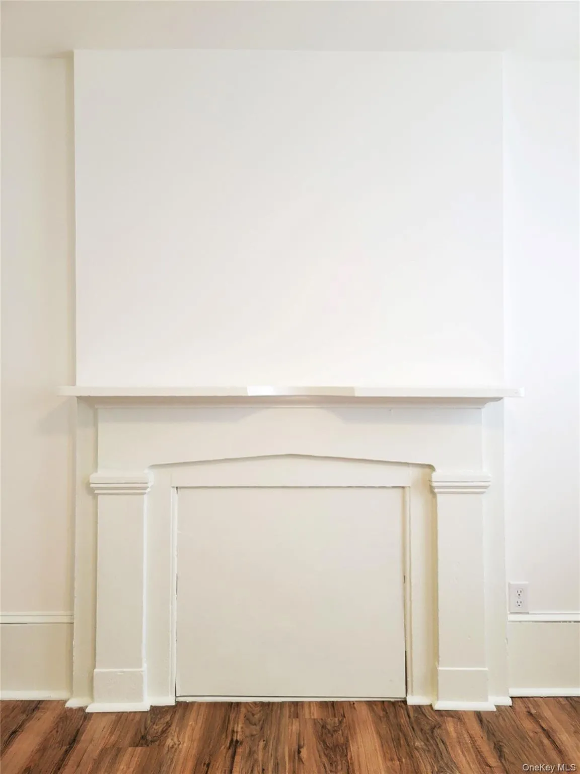 Detailed view of wood finished floors and baseboards Detailed view of wood finished floors and baseboards