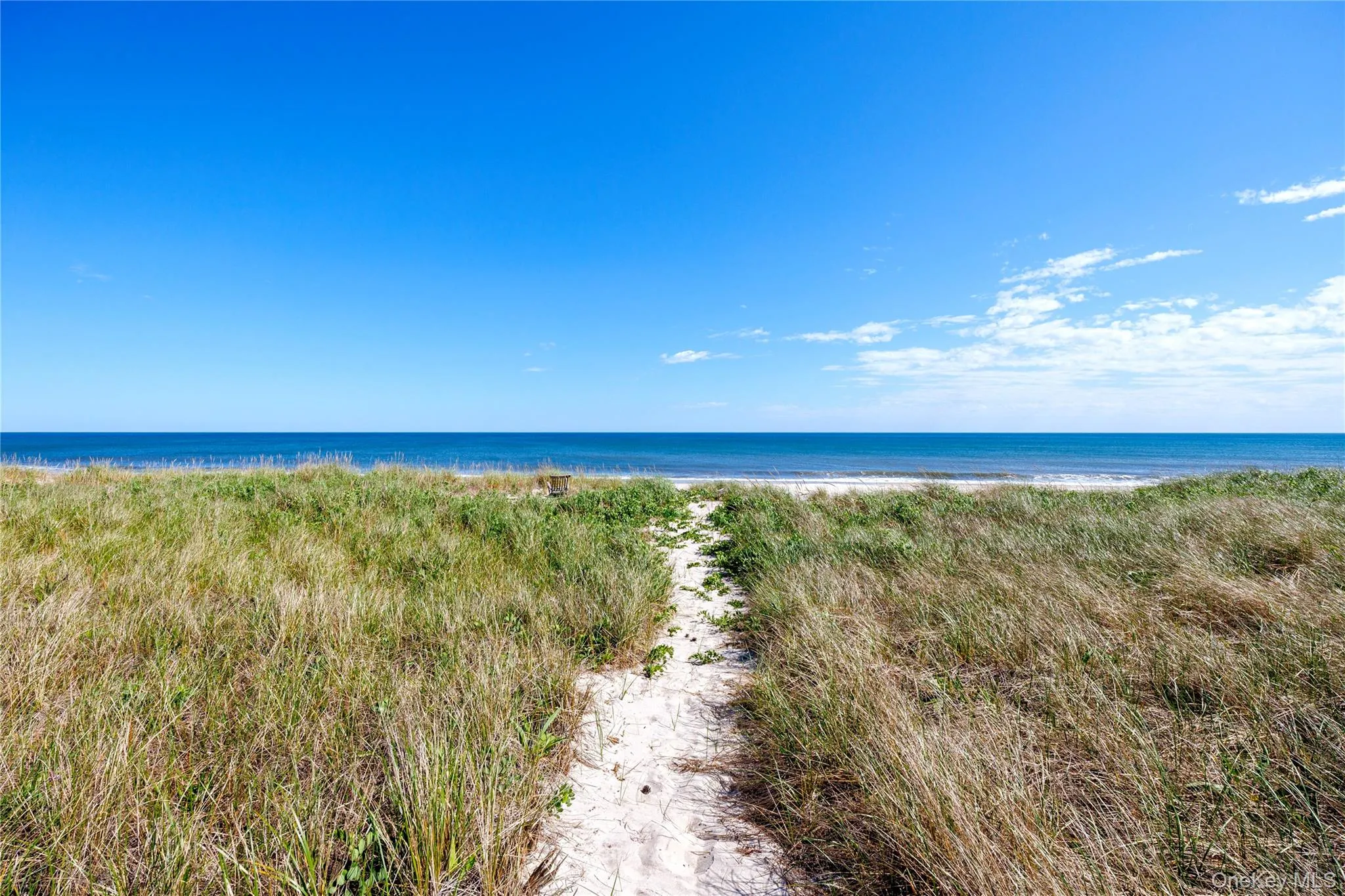 Water view featuring local beach Water view featuring local beach