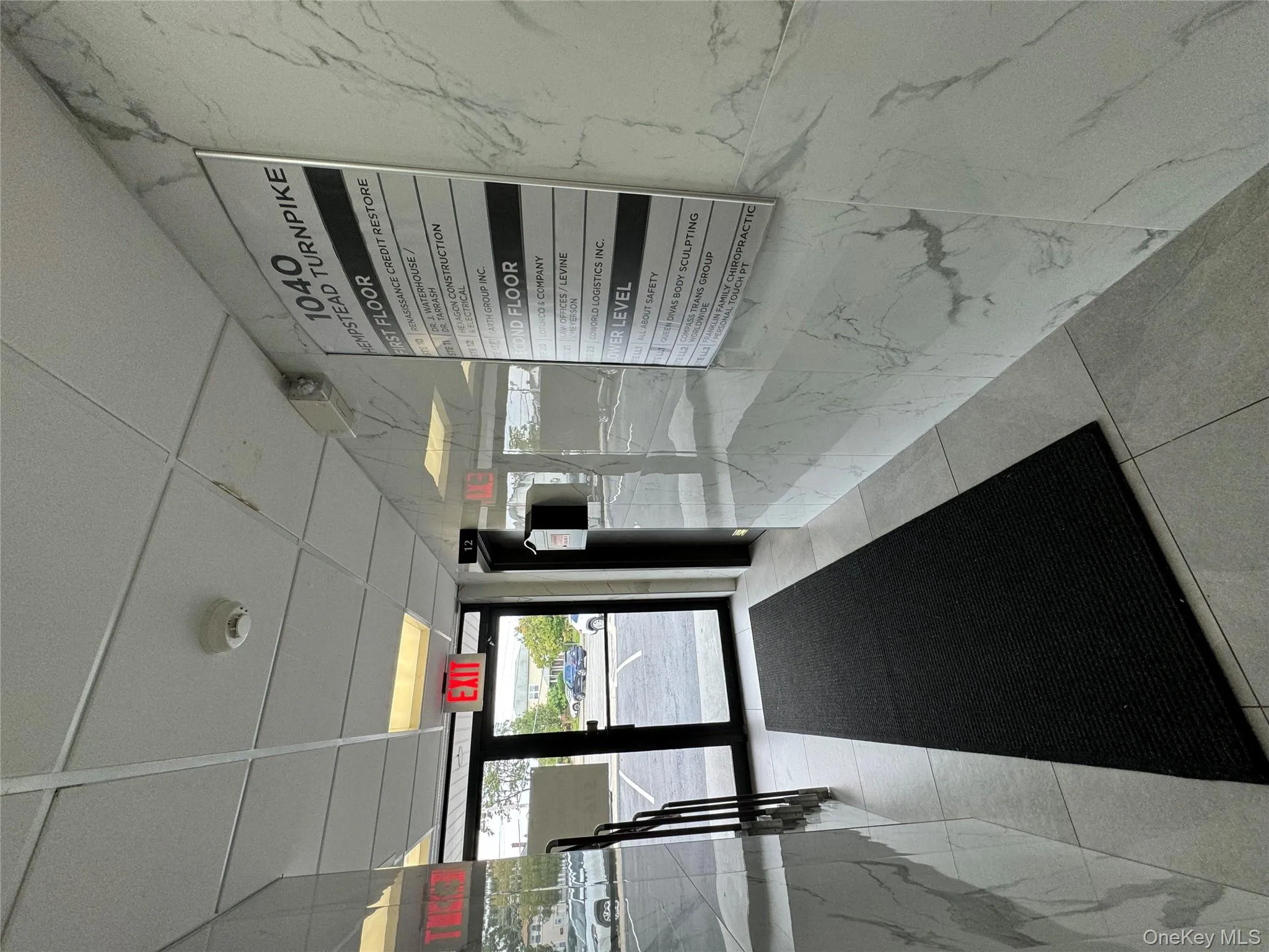 Lobby with a paneled ceiling Lobby with a paneled ceiling