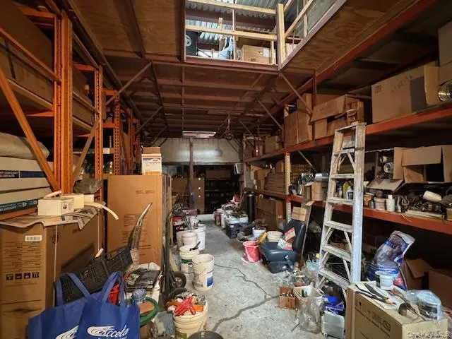 Misc room with concrete flooring Misc room with concrete flooring