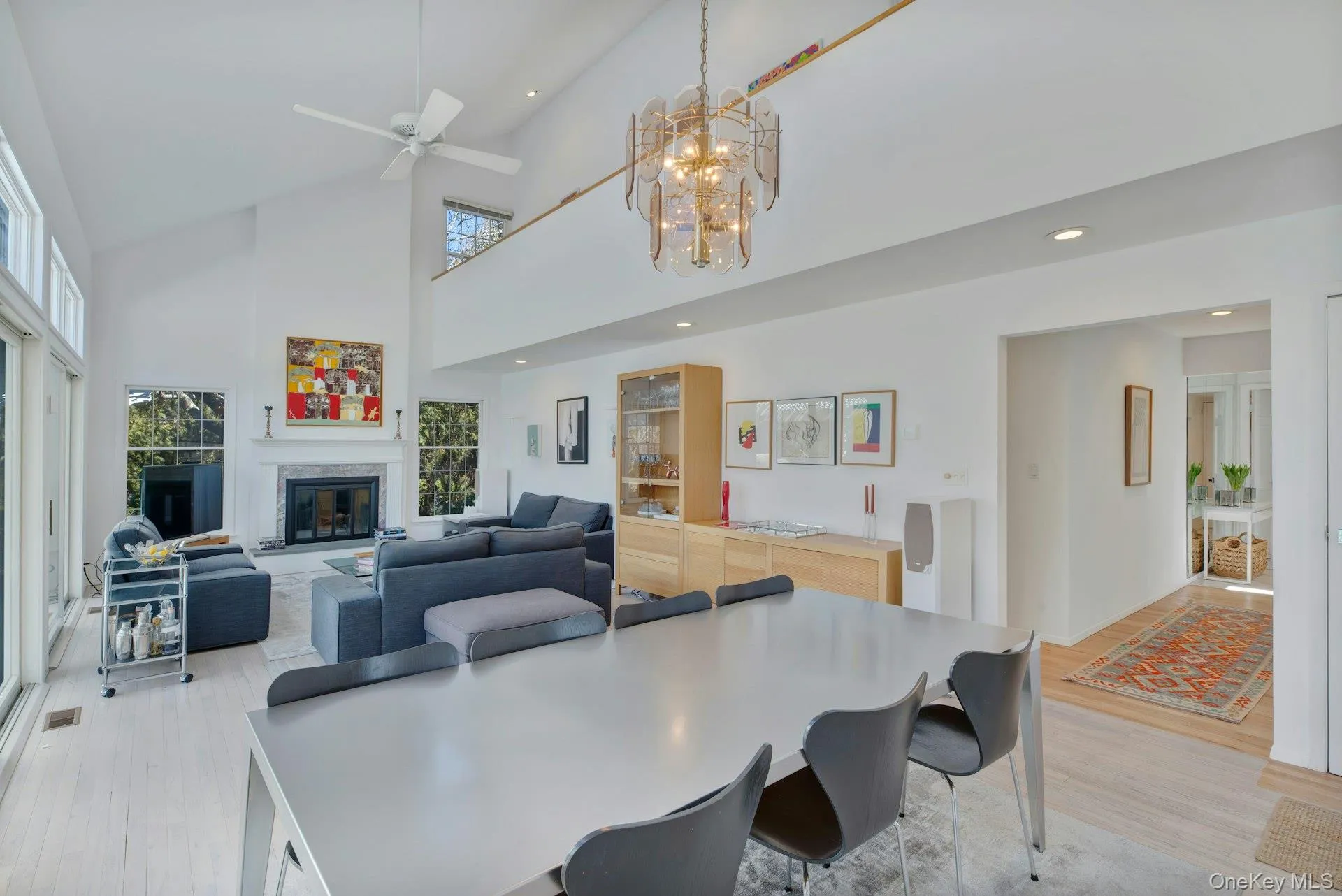 Dining area with chandelier and recessed lighting, off kitchen and living room Dining area with chandelier and recessed lighting, off kitchen and living room