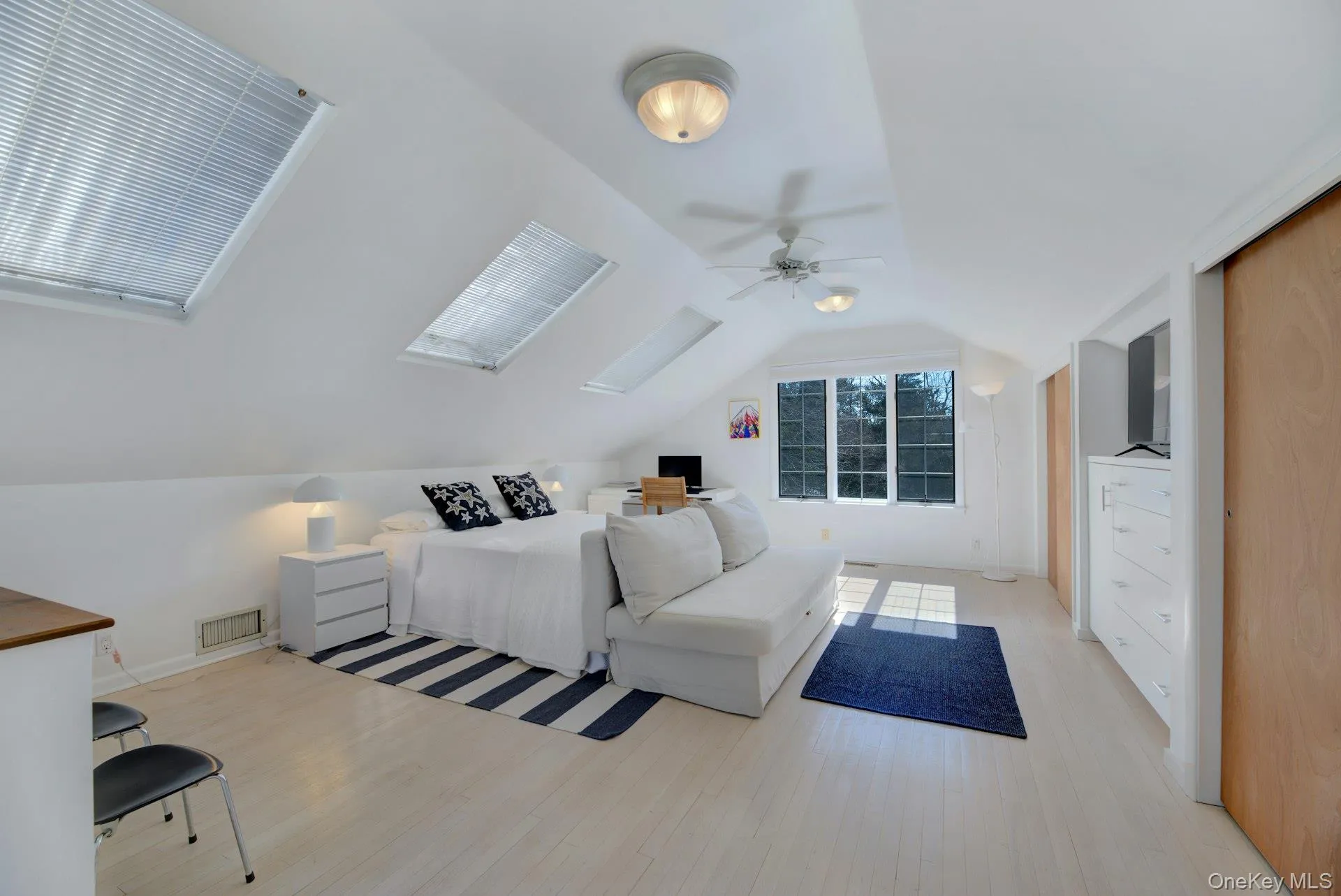 Private En-Suite Bedroom with Separate Entrance featuring lofted ceiling Private En-Suite Bedroom with Separate Entrance featuring lofted ceiling