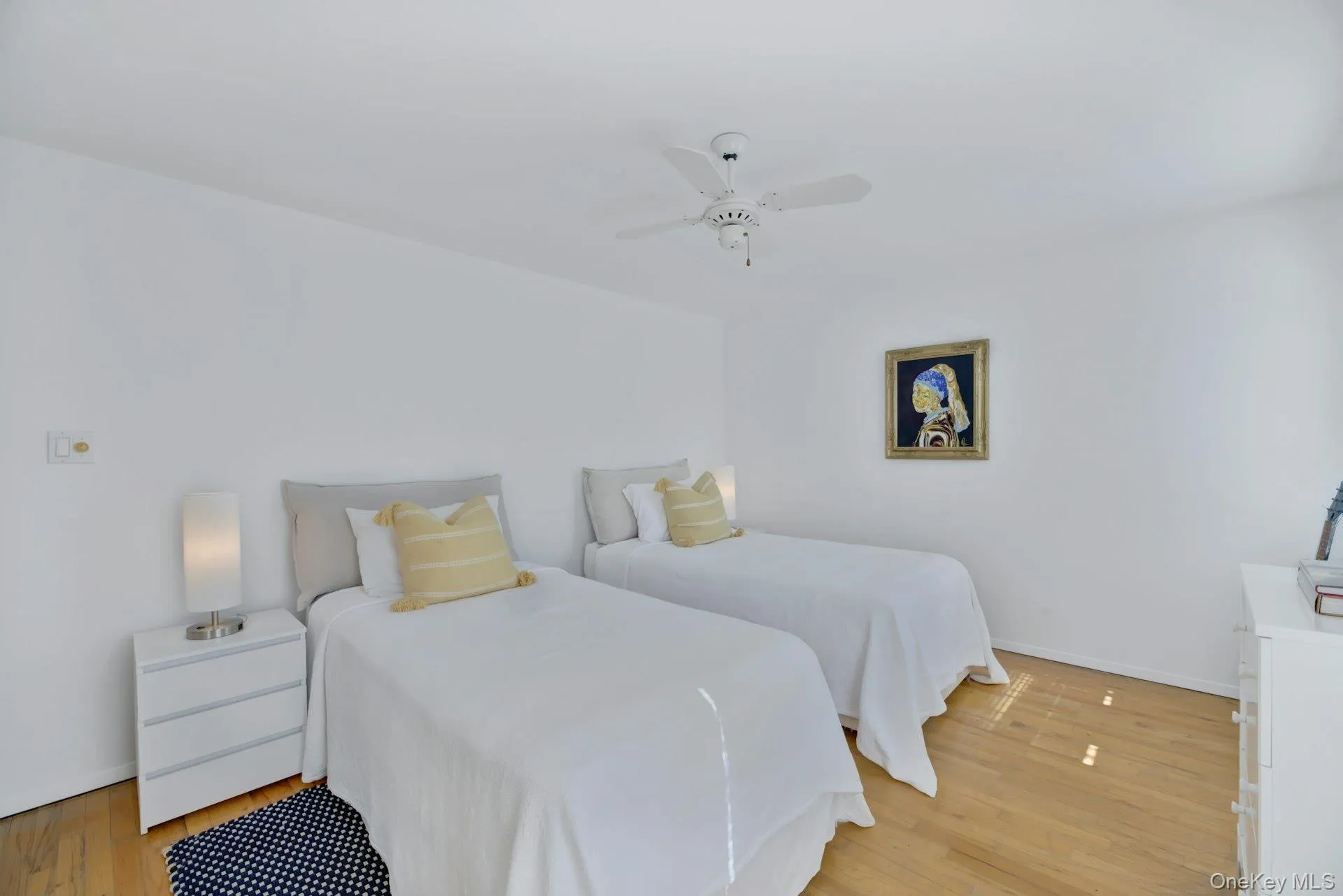 2nd floor twin bedroom featuring ceiling fan and television 2nd floor twin bedroom featuring ceiling fan and television