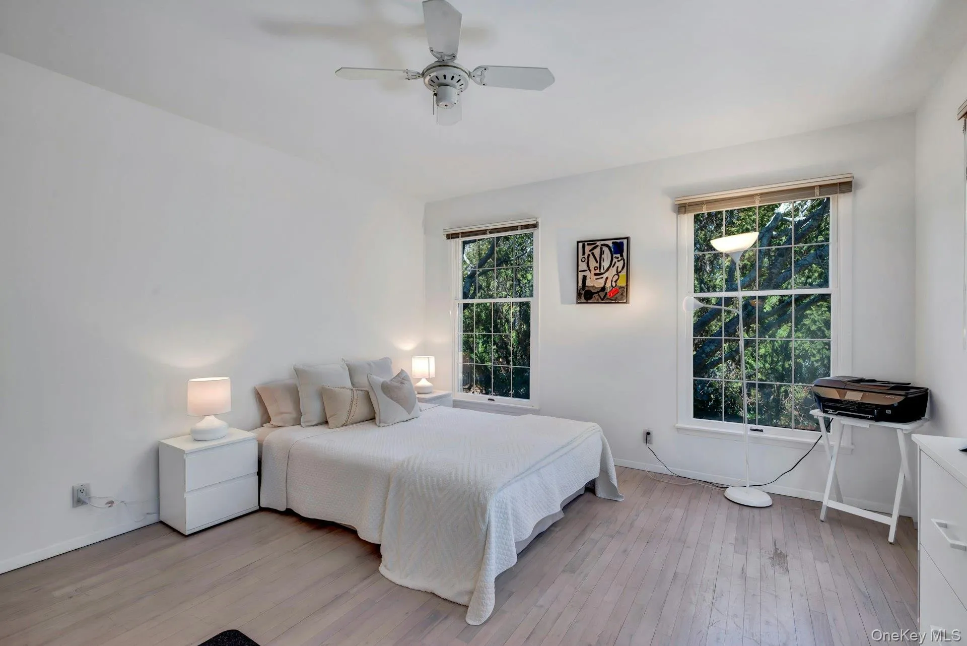 First floor bedroom doubling as home office with ceiling fan First floor bedroom doubling as home office with ceiling fan