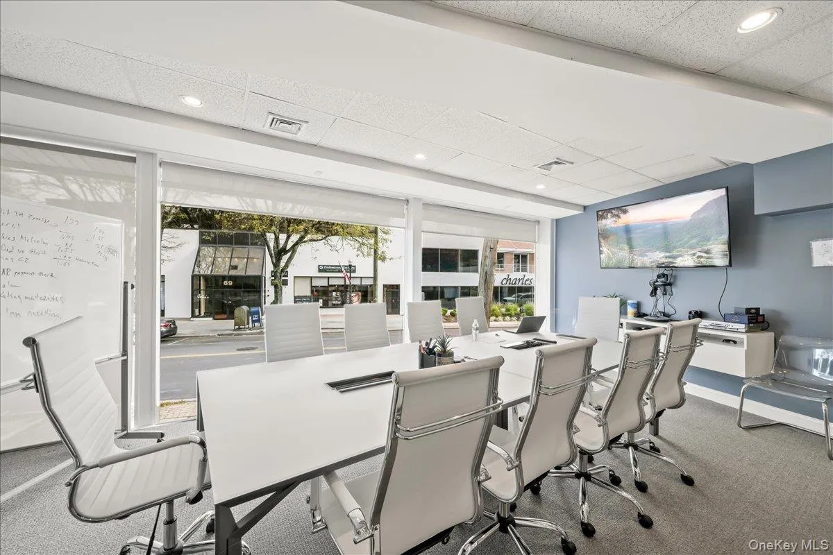 Carpeted dining room featuring a drop ceiling, an office area, and recessed lighting Carpeted dining room featuring a drop ceiling, an office area, and recessed lighting