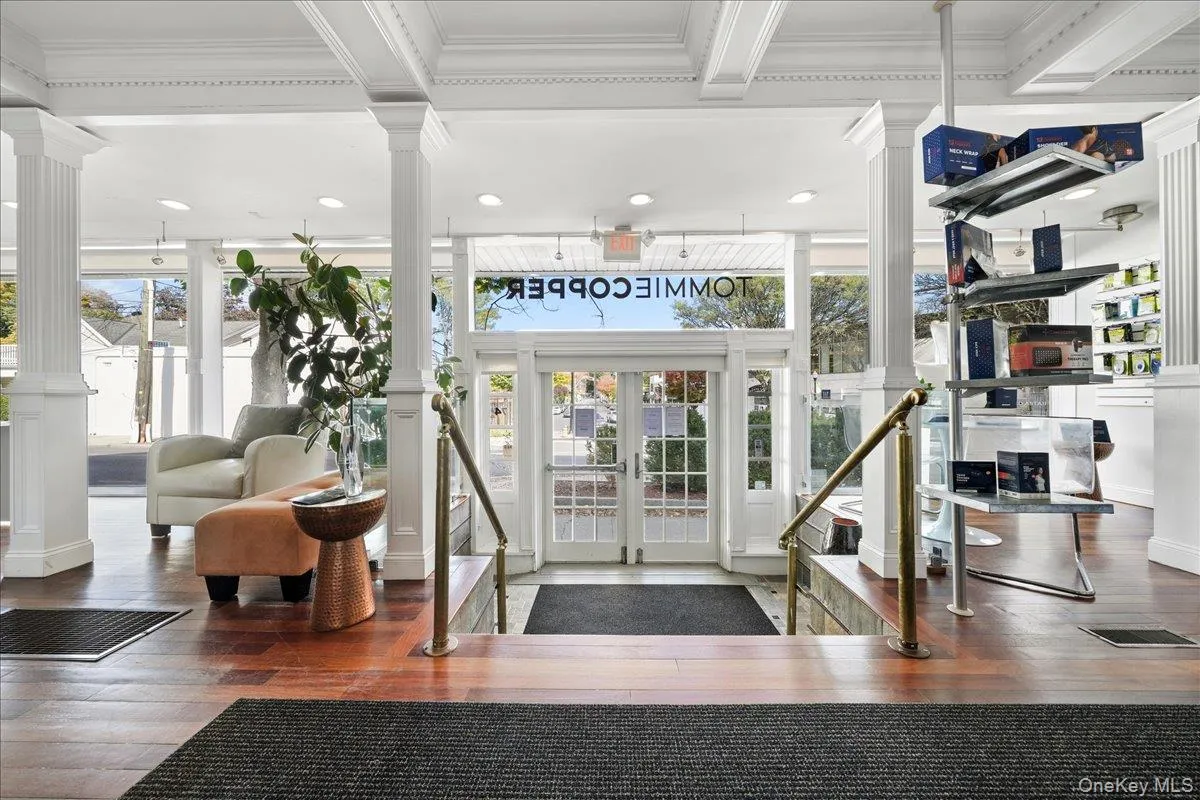 Common area featuring ornamental molding and recessed lighting Common area featuring ornamental molding and recessed lighting