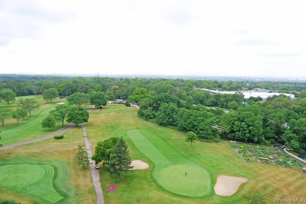 Aerial view of a local golf course and a tree filled landscape Aerial view of a local golf course and a tree filled landscape