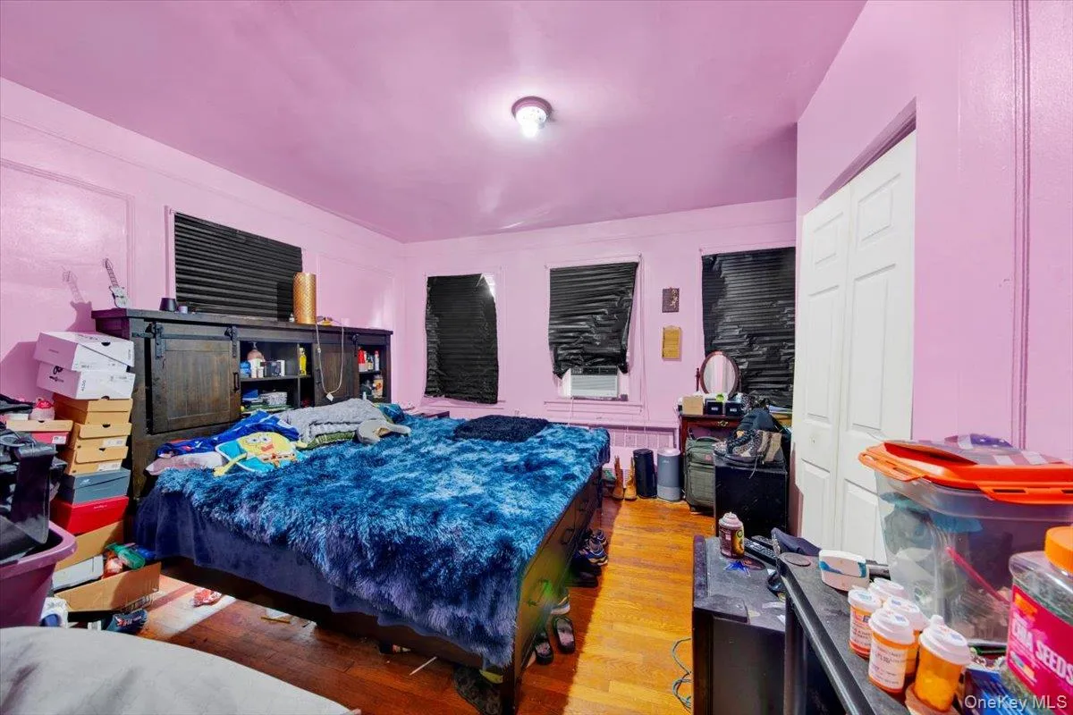 Bedroom with wood finished floors Bedroom with wood finished floors