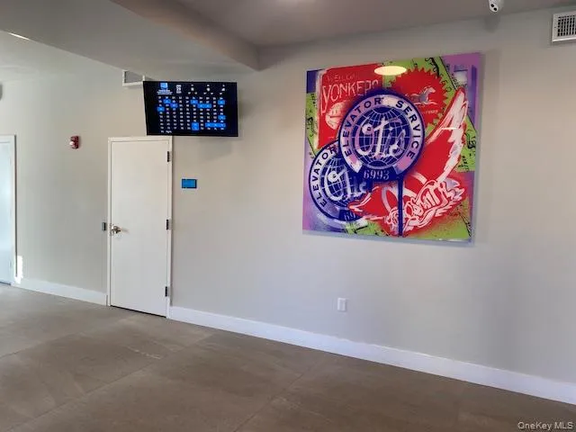 Unfurnished room with baseboards Unfurnished room with baseboards