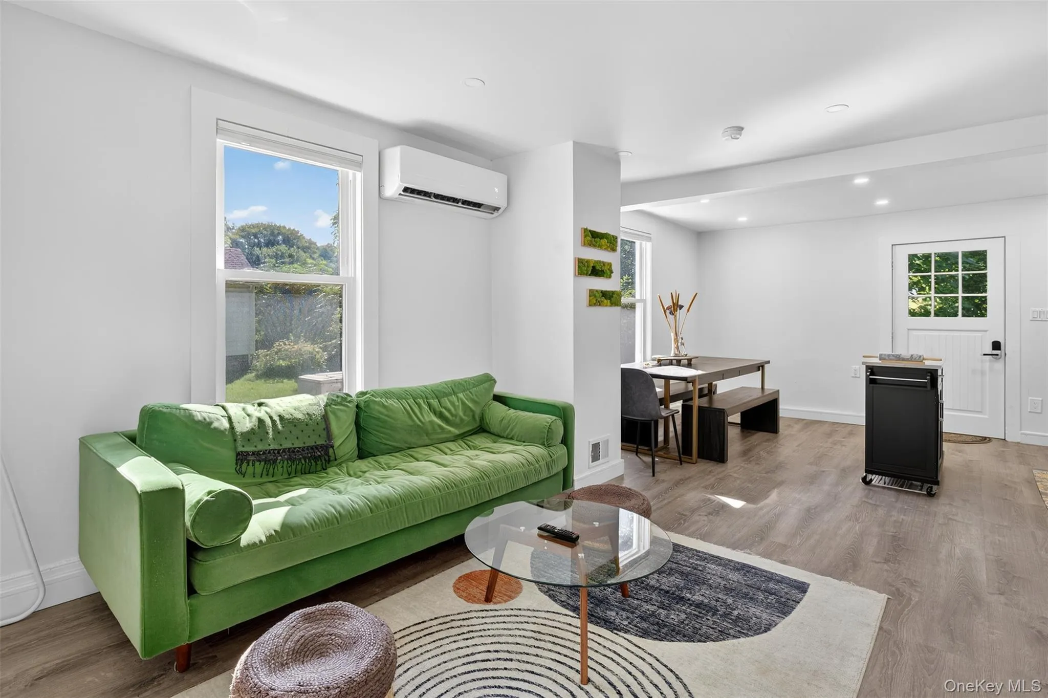 Bright living room furnished with stylish yet practical furniture Bright living room furnished with stylish yet practical furniture