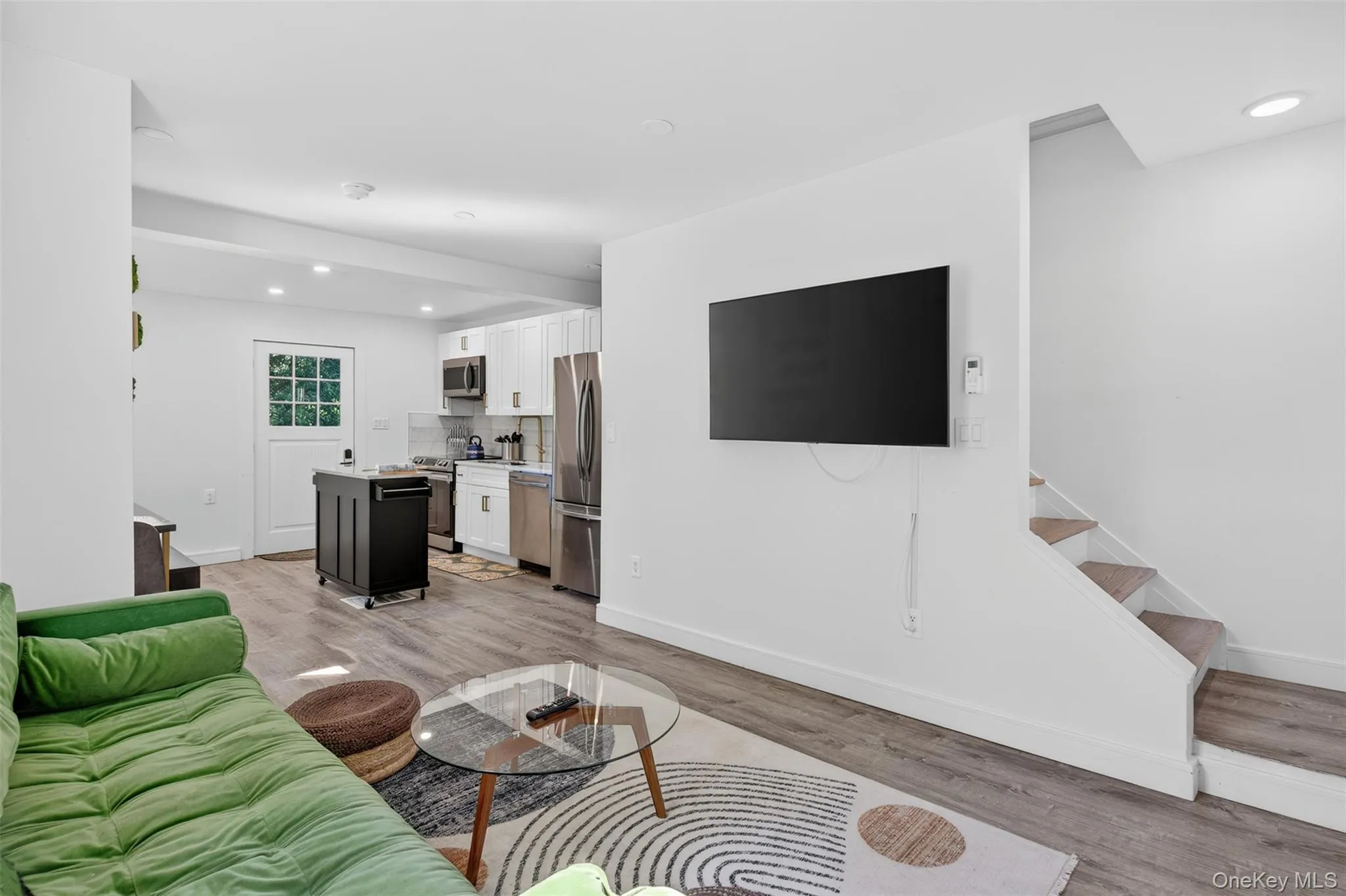 Bright living room furnished with stylish yet practical furniture Bright living room furnished with stylish yet practical furniture