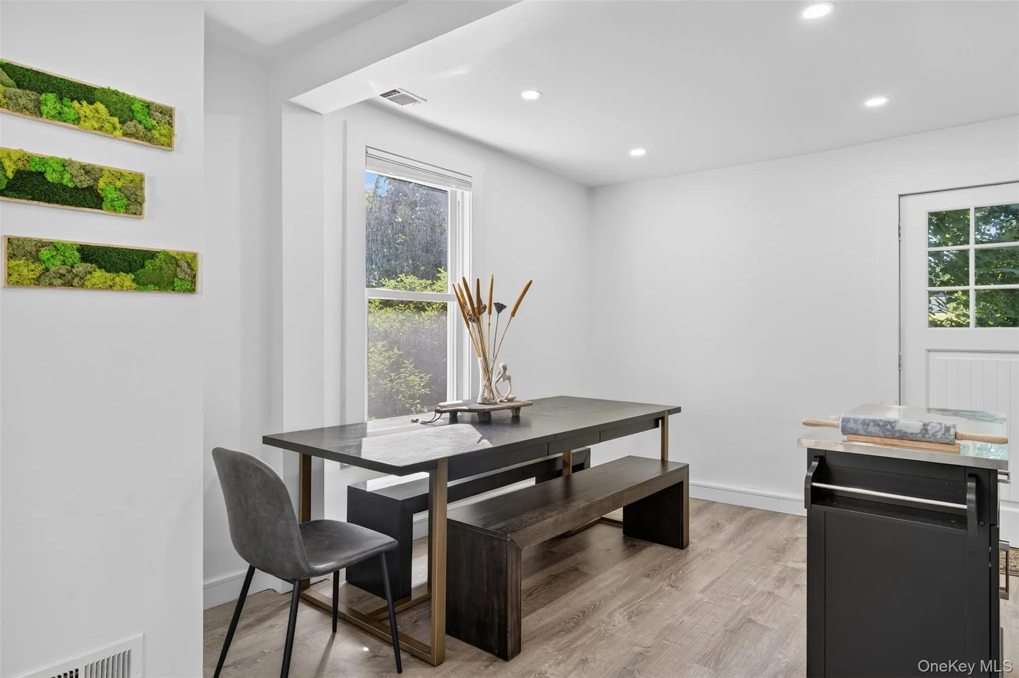 Bright, open space with large dining table Bright, open space with large dining table