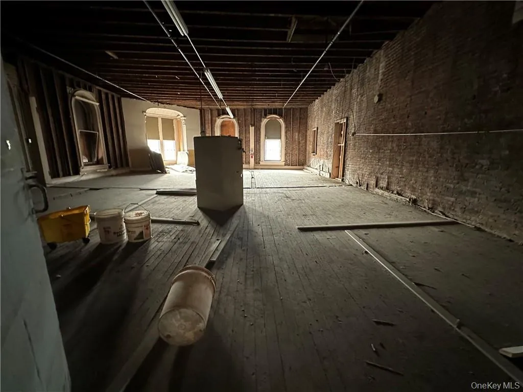 Misc room featuring wood-type flooring Misc room featuring wood-type flooring