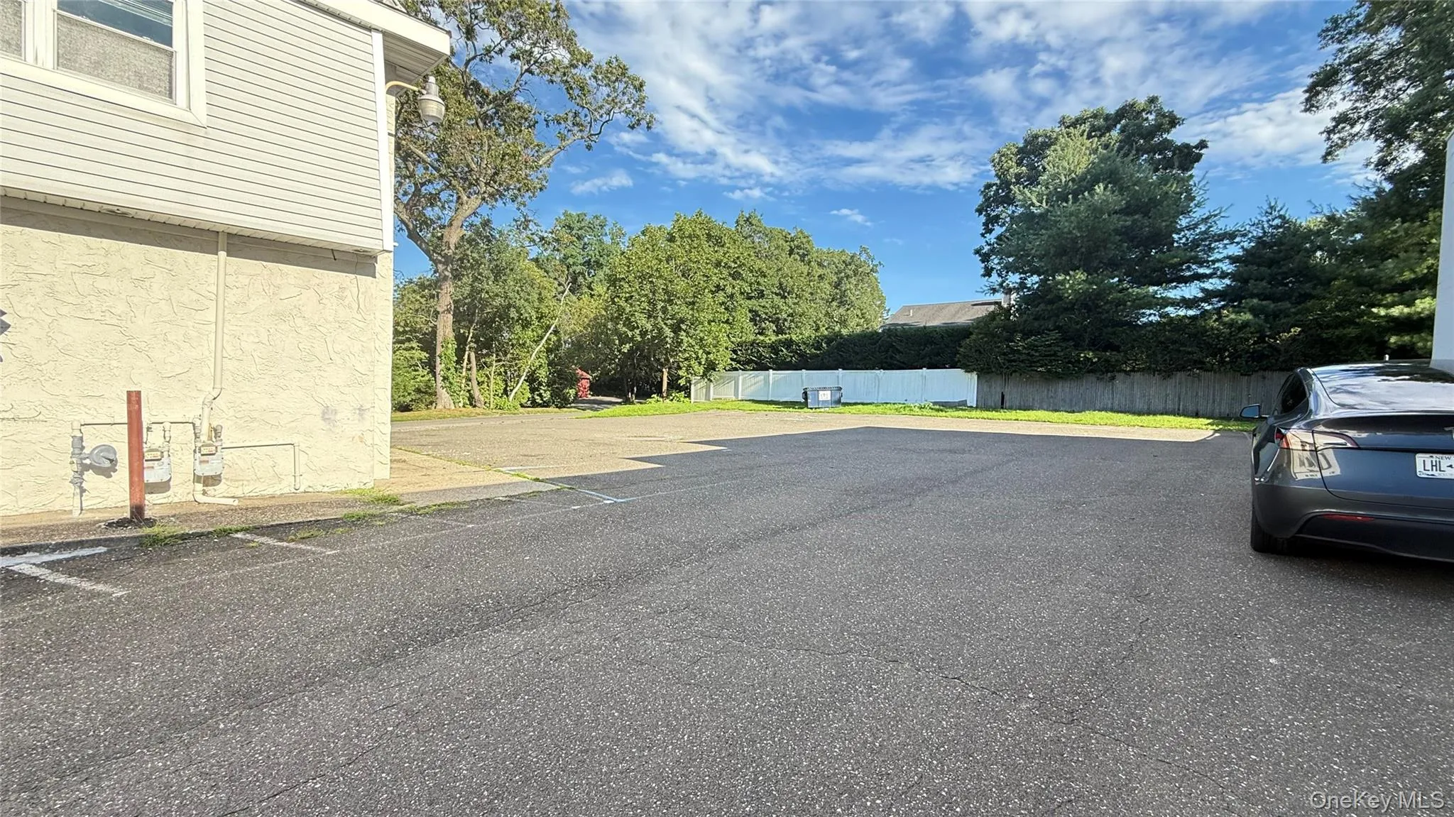 View of uncovered parking lot View of uncovered parking lot