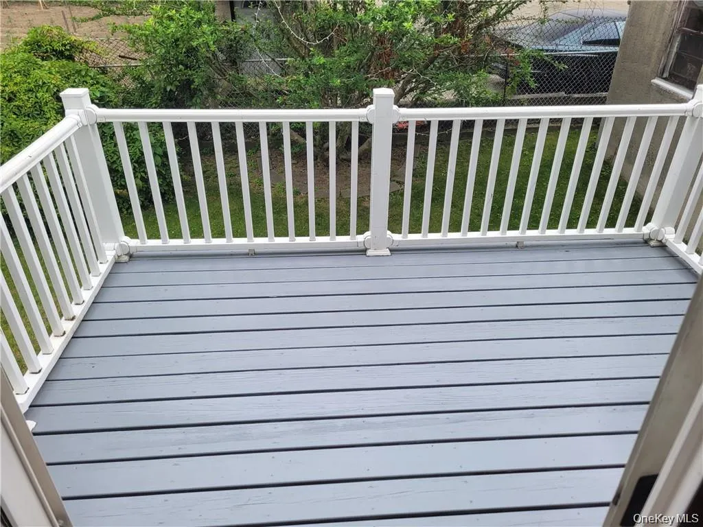 Deck featuring a yard Deck featuring a yard
