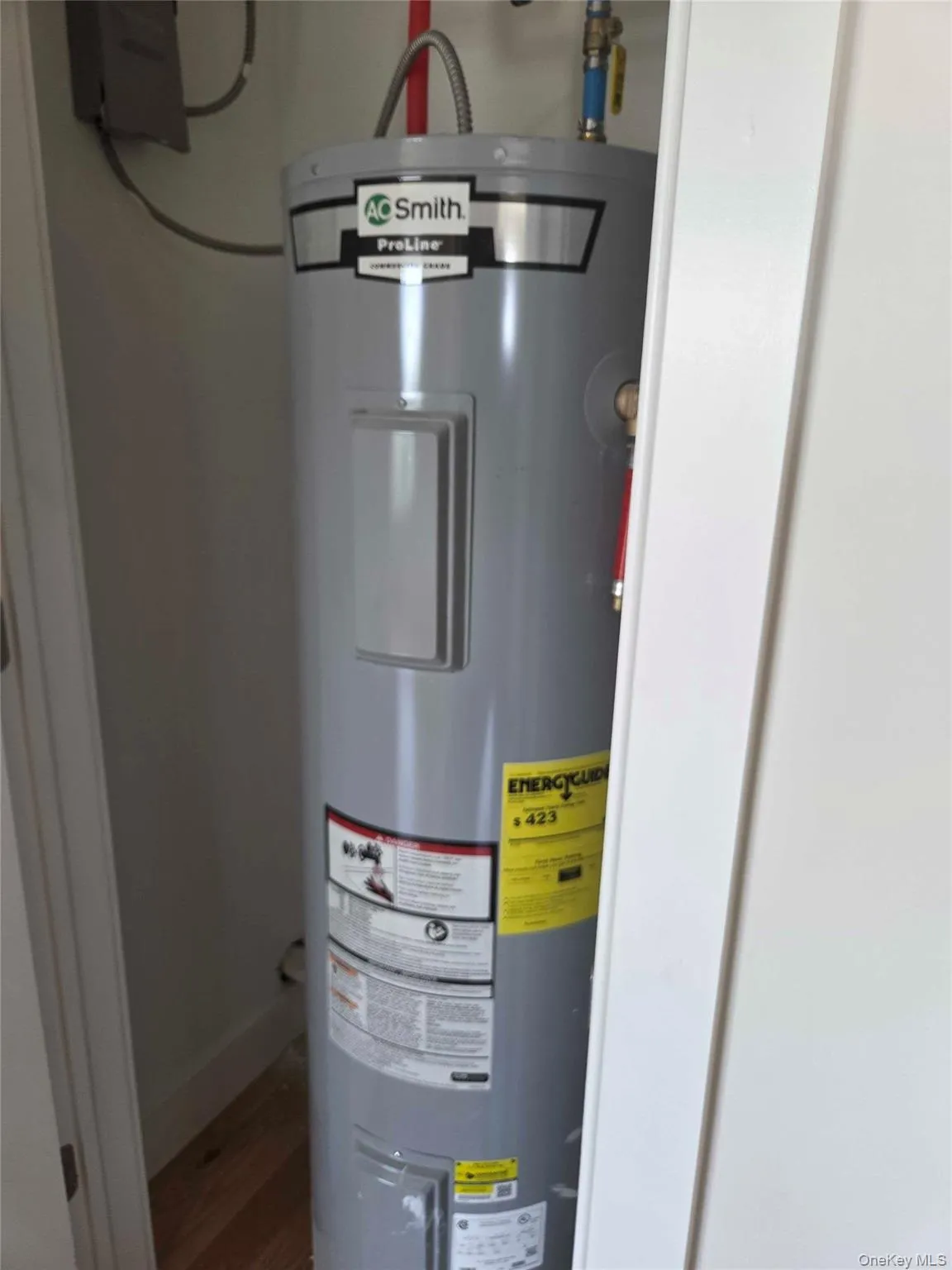 Utilities featuring electric water heater Utilities featuring electric water heater