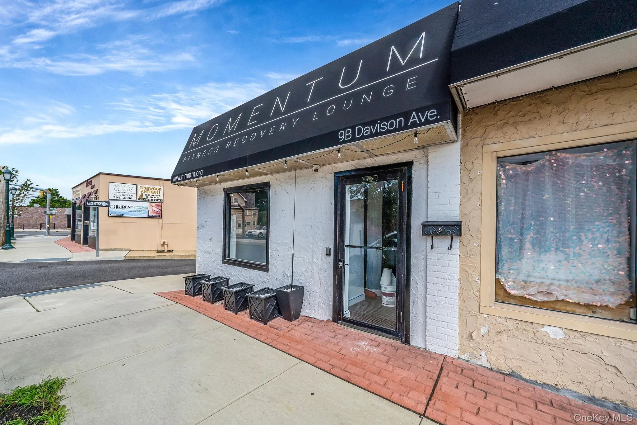 View of exterior entry with brick siding View of exterior entry with brick siding