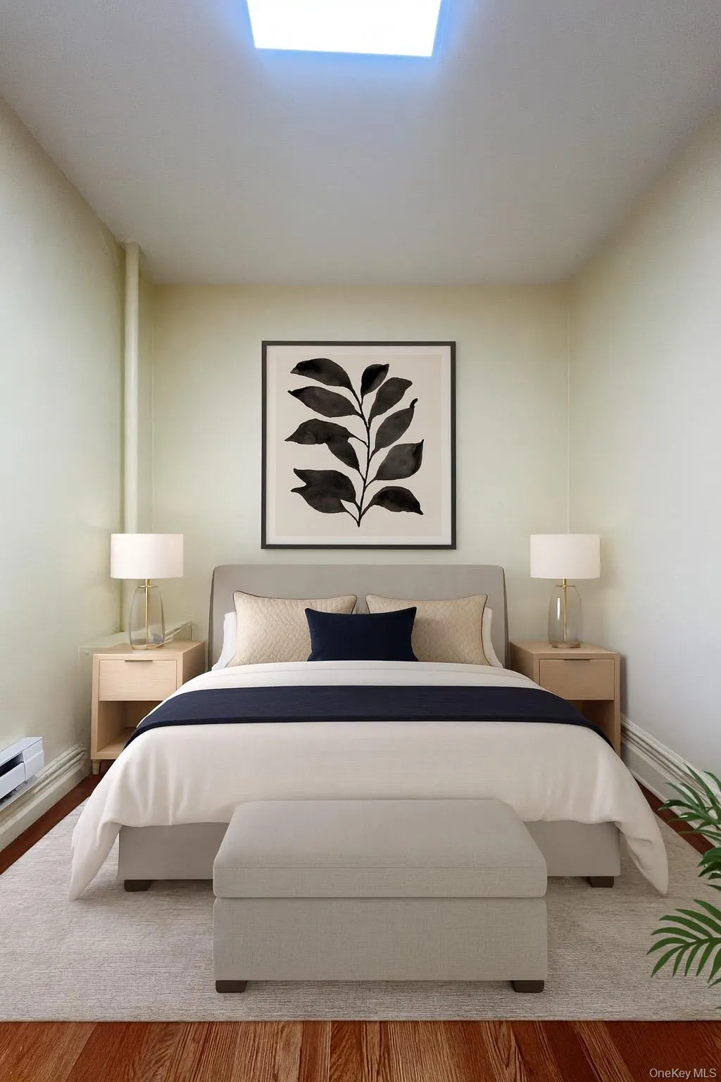 Bedroom #1 featuring wood finished floors and a baseboard radiator Bedroom #1 featuring wood finished floors and a baseboard radiator