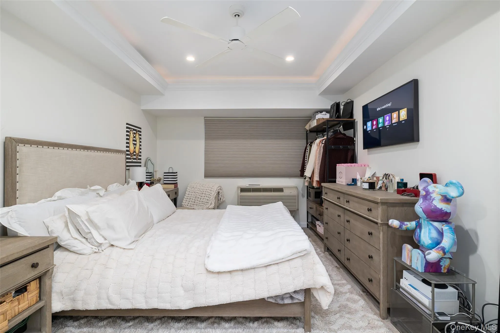 Bedroom featuring crown molding, recessed lighting, and a ceiling fan Bedroom featuring crown molding, recessed lighting, and a ceiling fan