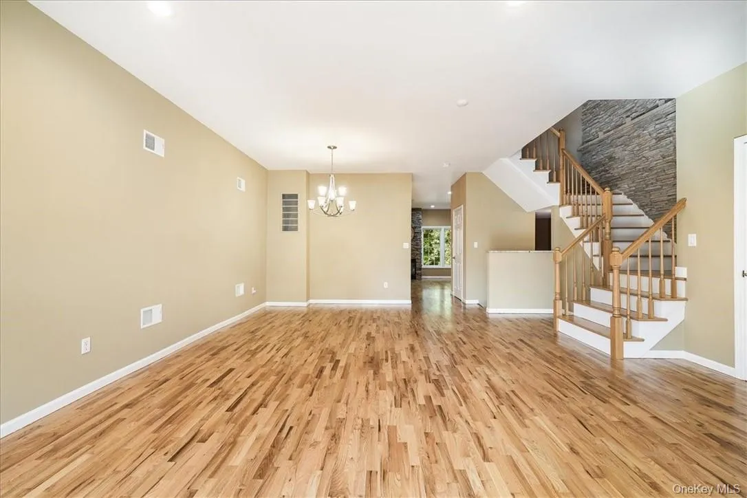 Step into a bright, open-concept living and dining area with plenty of space to relax or entertain. Step into a bright, open-concept living and dining area with plenty of space to relax or entertain.