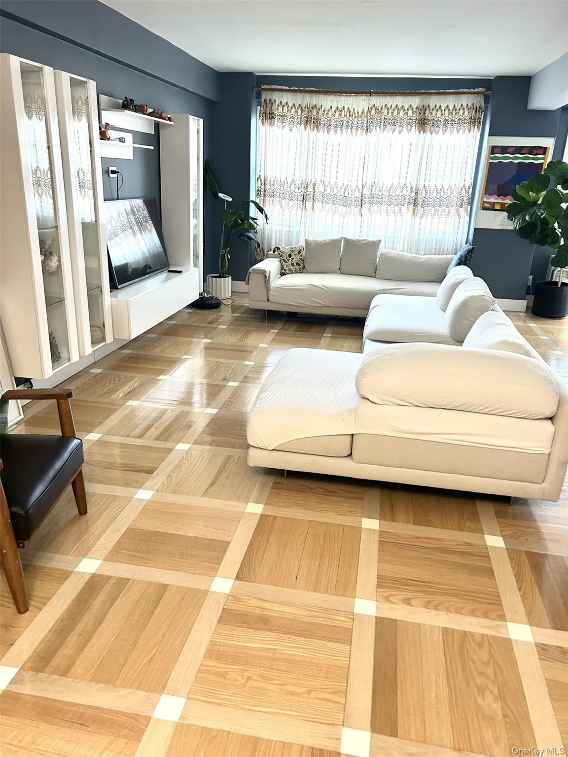 Living area featuring light wood-type flooring Living area featuring light wood-type flooring