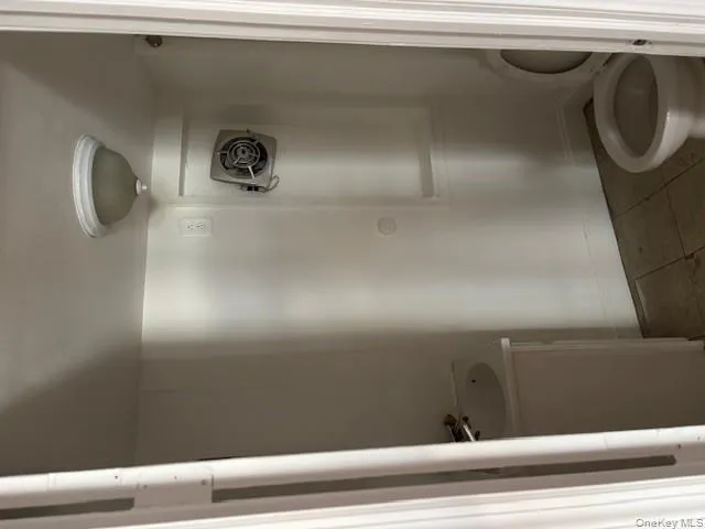 Bathroom featuring tile patterned floors and vanity Bathroom featuring tile patterned floors and vanity