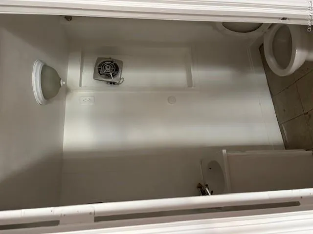 Bathroom featuring tile patterned floors and vanity Bathroom featuring tile patterned floors and vanity