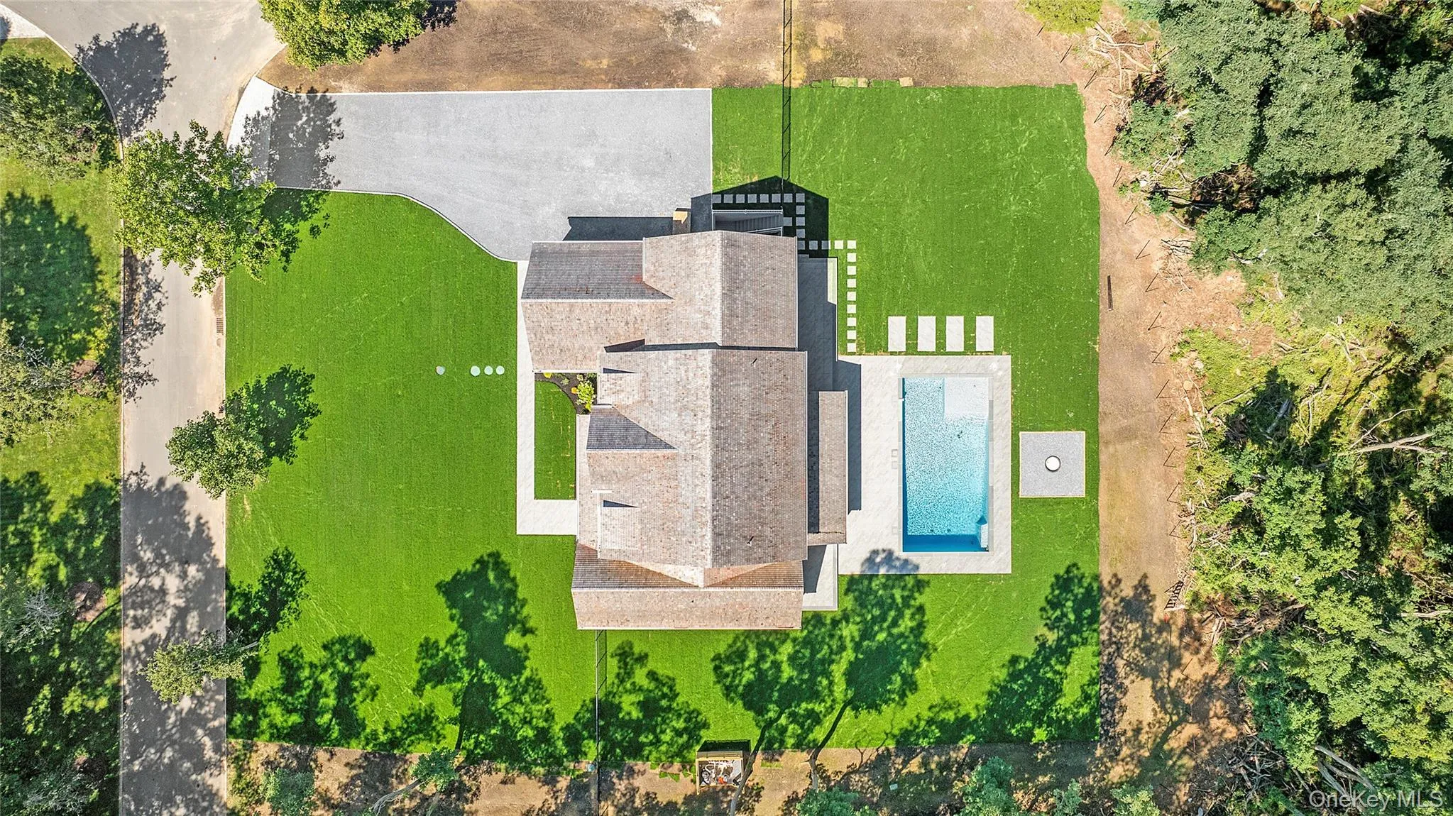View from above of property with a pool View from above of property with a pool