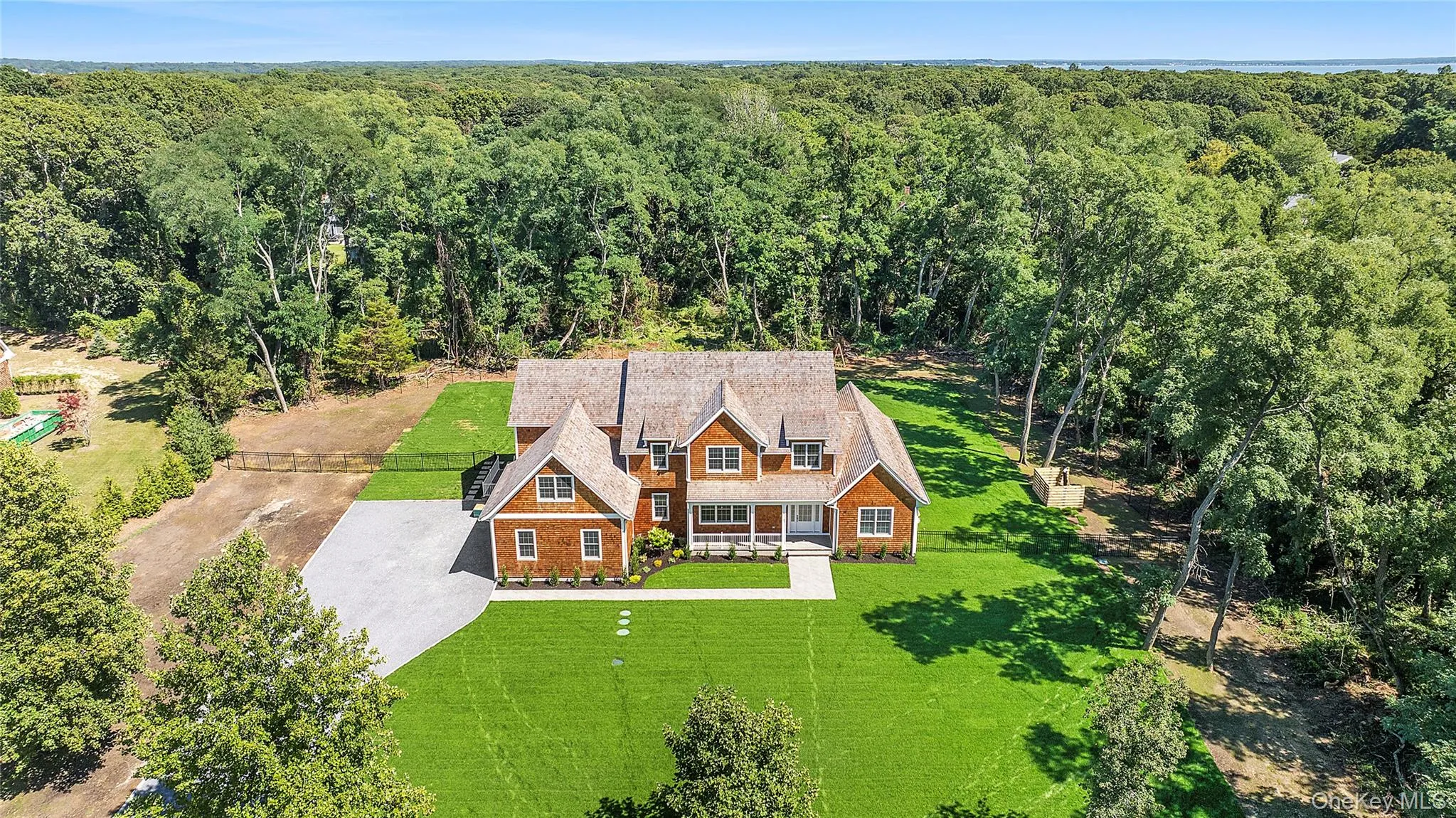 View of subject property with a heavily wooded area View of subject property with a heavily wooded area