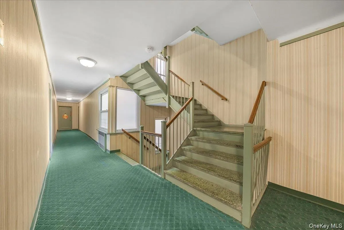 Stairway with carpet and baseboards Stairway with carpet and baseboards