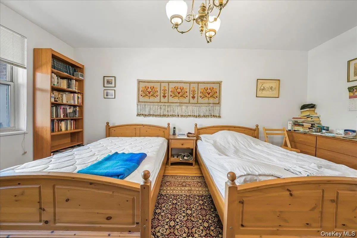 Bedroom with a chandelier Bedroom with a chandelier